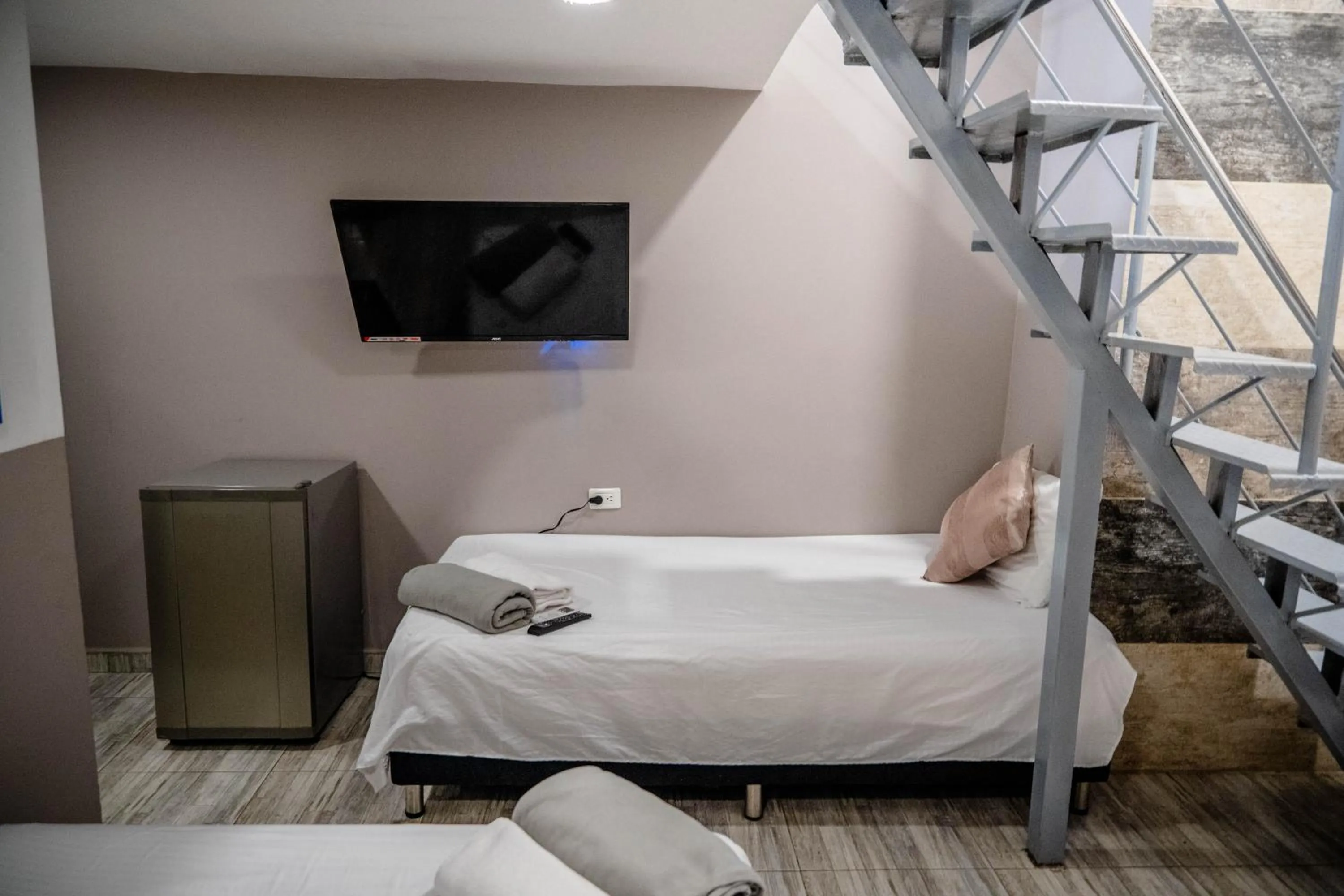 Bed in Bahia 79 Apartasuites Cerca al Centro