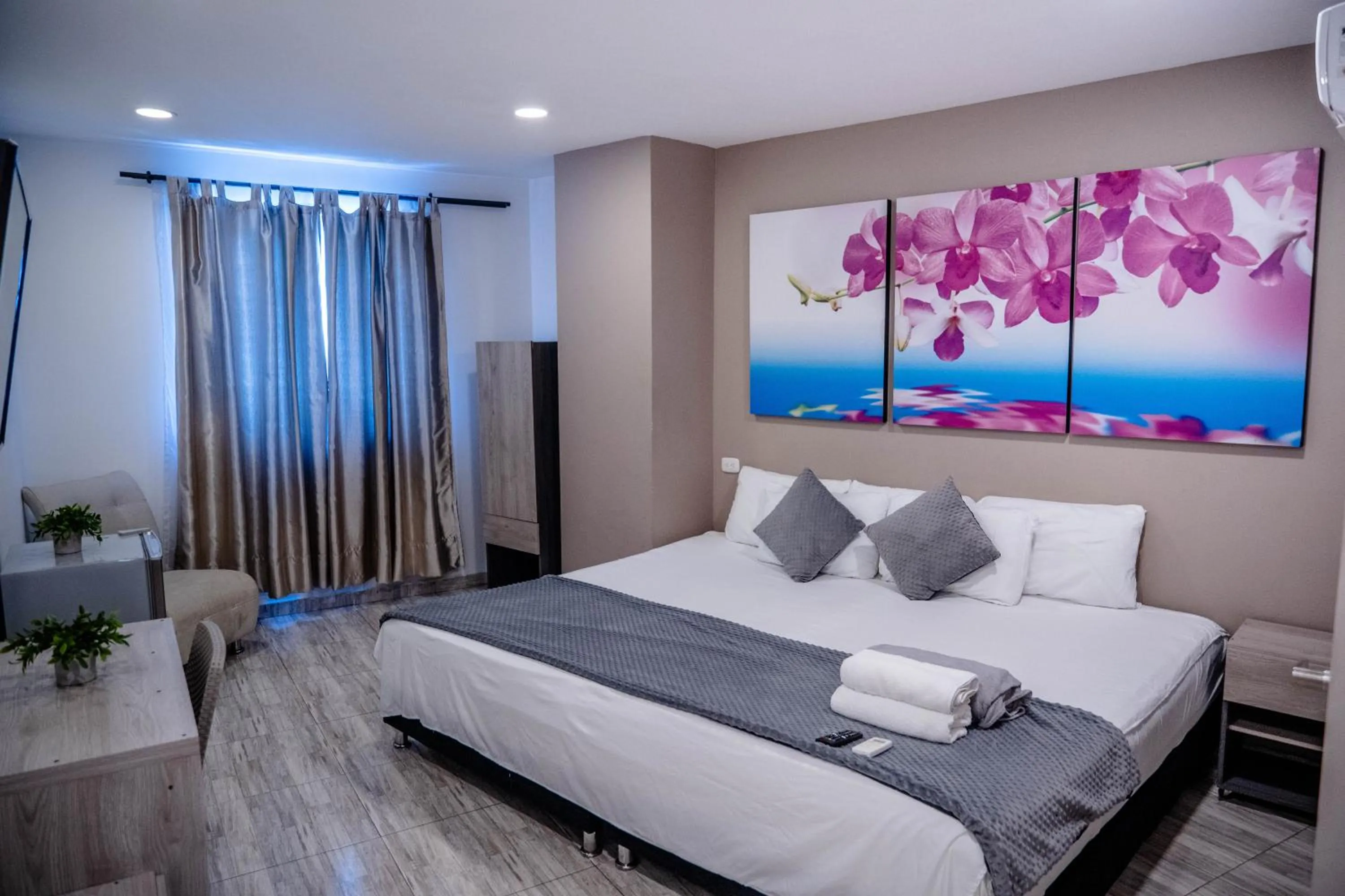 Bed in Bahia 79 Apartasuites Cerca al Centro