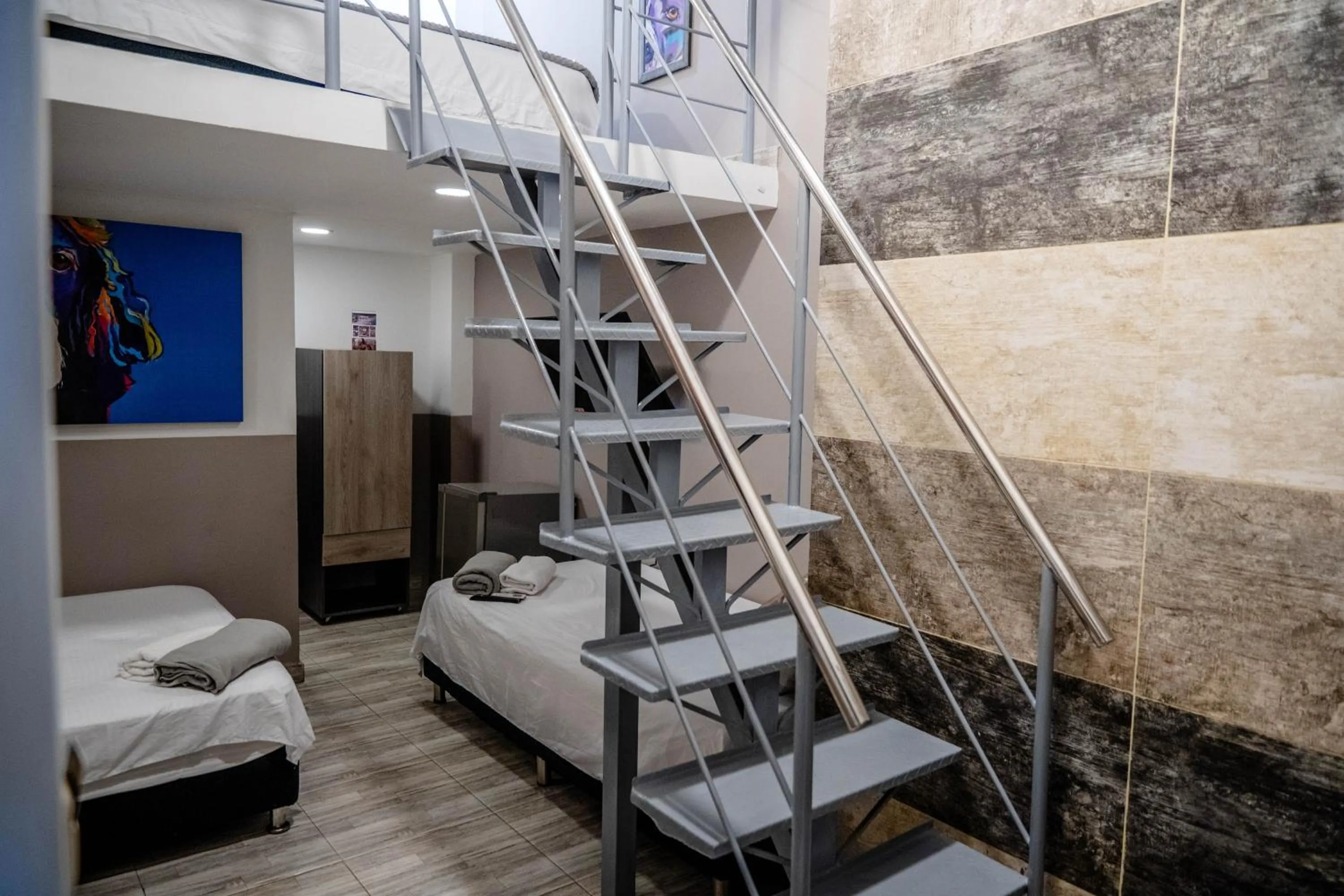 Bed in Bahia 79 Apartasuites Cerca al Centro