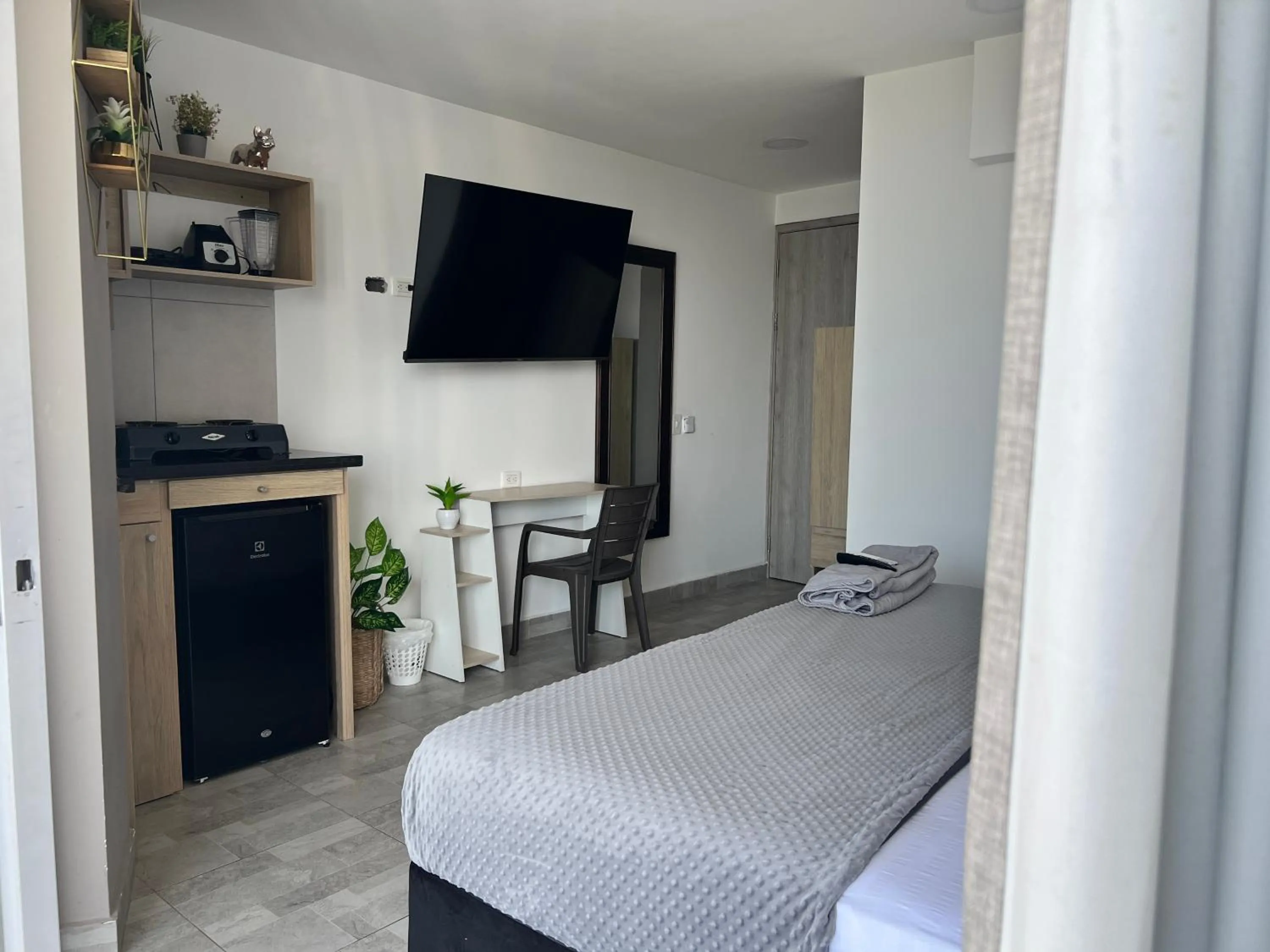 Bed in Bahia 79 Apartasuites Cerca al Centro