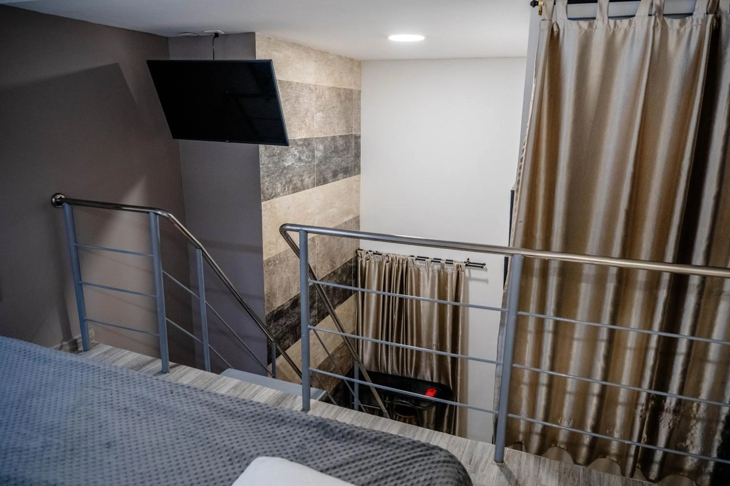 Bed in Bahia 79 Apartasuites Cerca al Centro