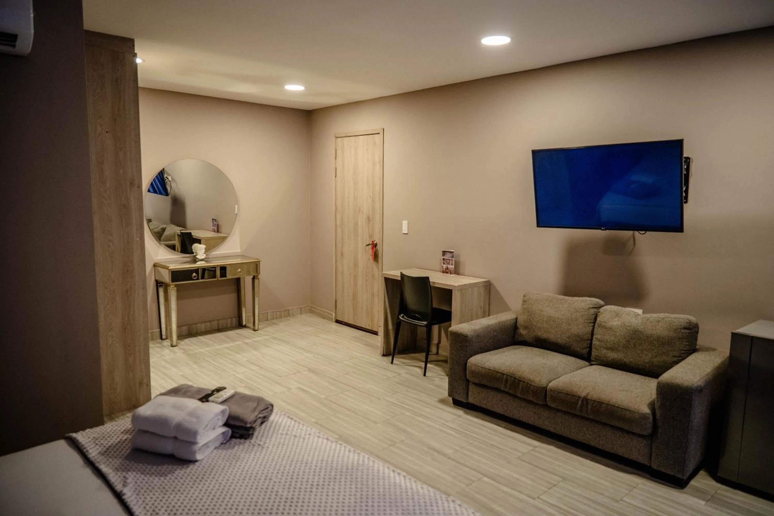 Bed in Bahia 79 Apartasuites Cerca al Centro