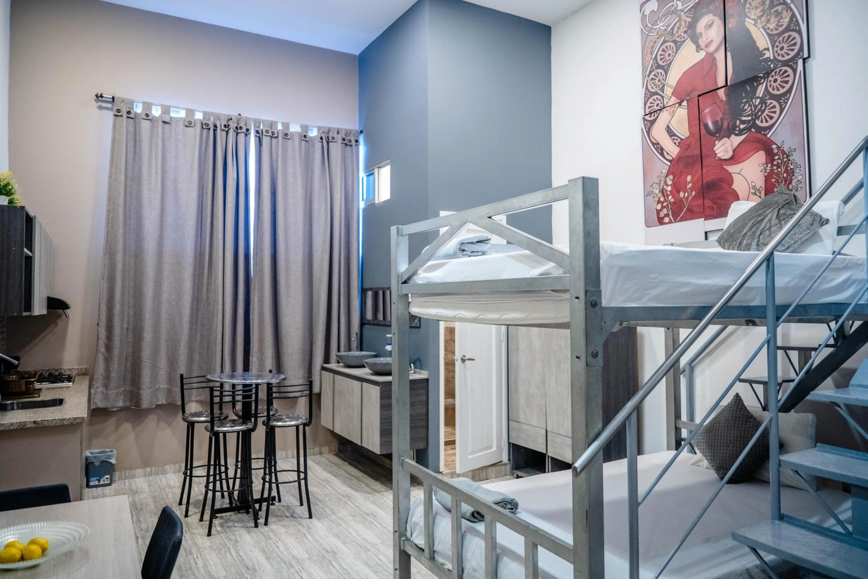 Bed in Bahia 79 Apartasuites Cerca al Centro