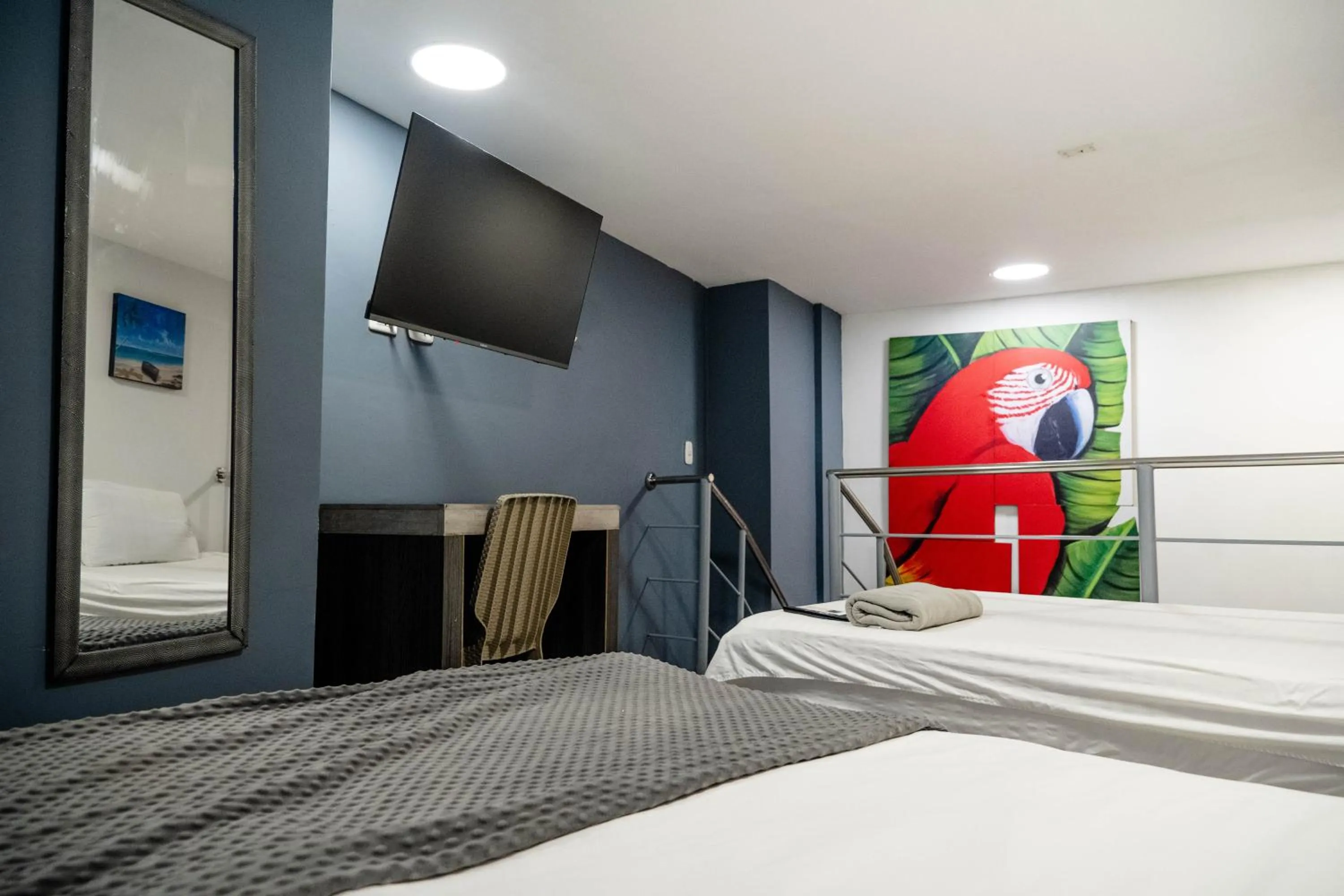 Bed in Bahia 79 Apartasuites Cerca al Centro