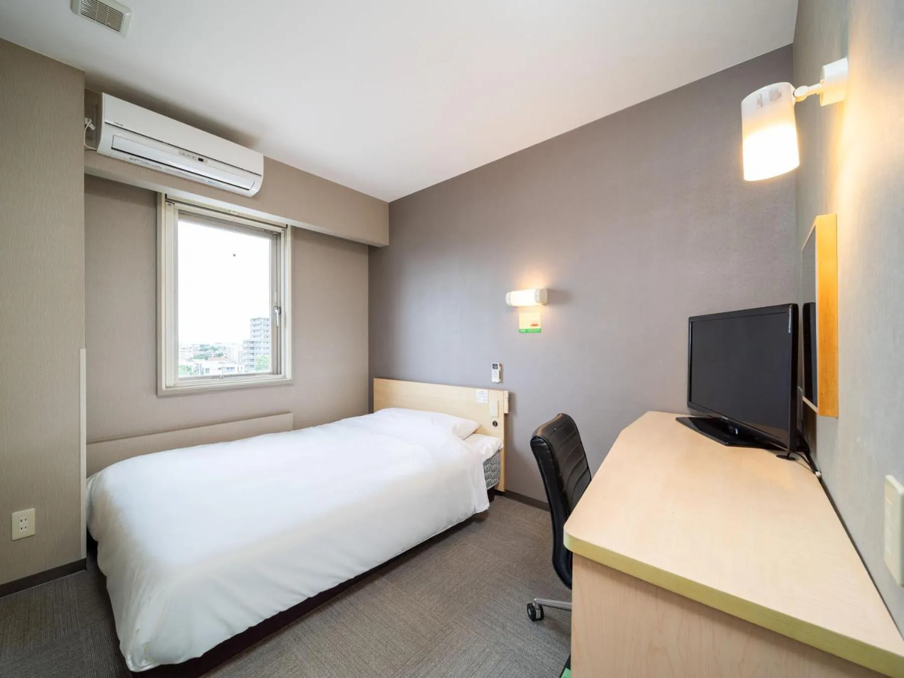 Bed in Super Hotel Fuji Inter