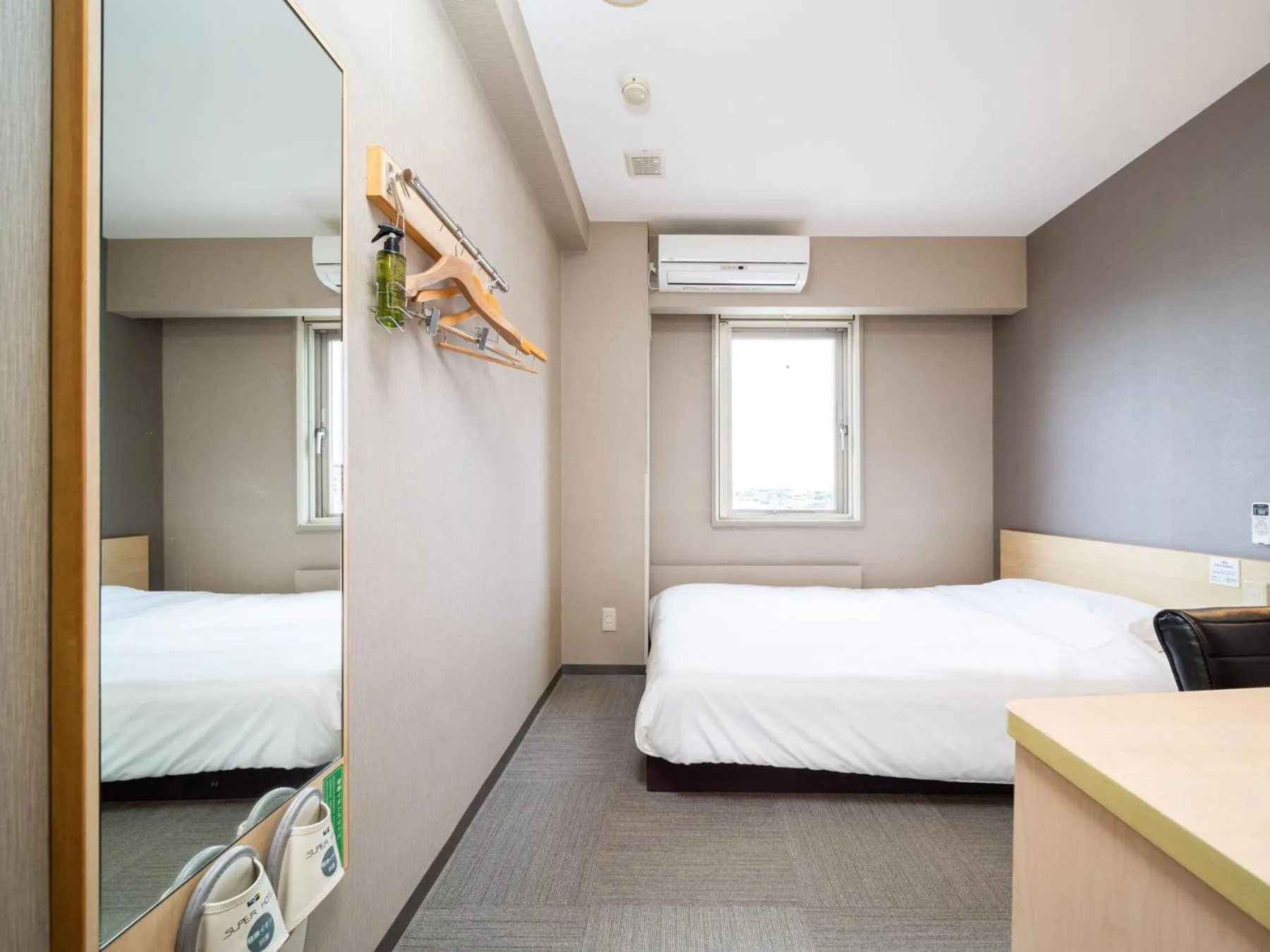 Bed in Super Hotel Fuji Inter