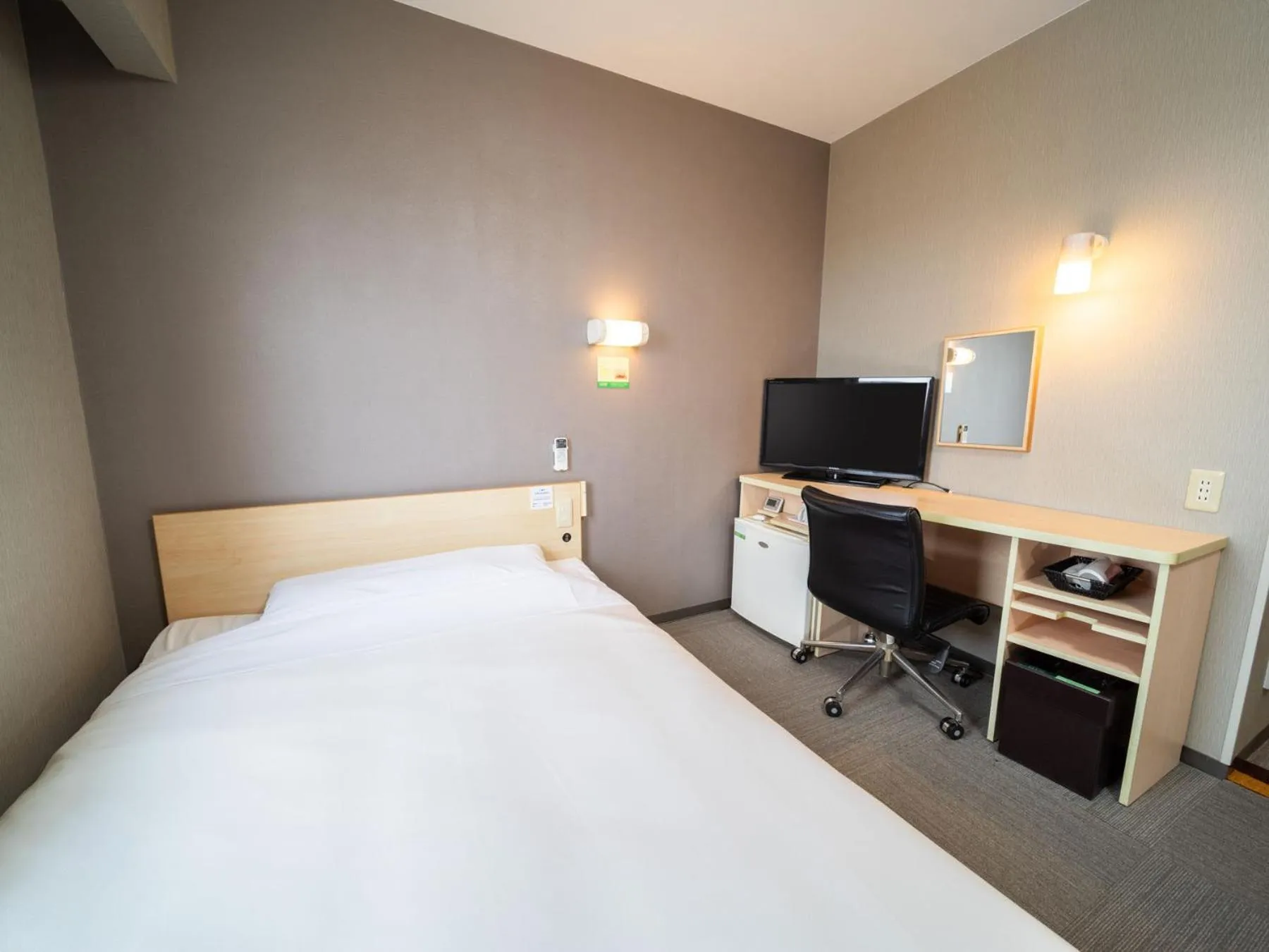 Bed in Super Hotel Fuji Inter