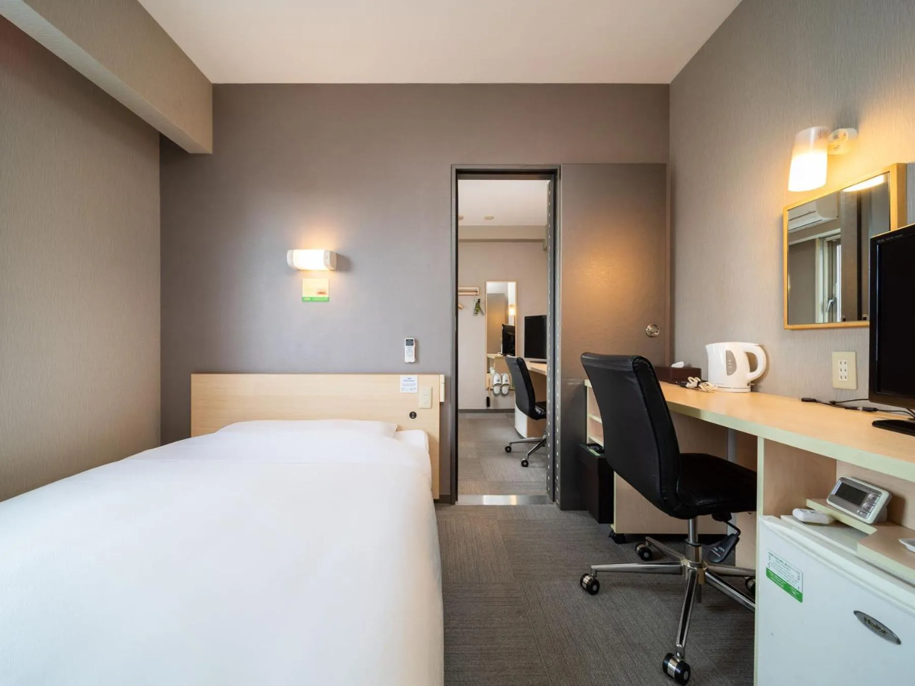 Bed in Super Hotel Fuji Inter