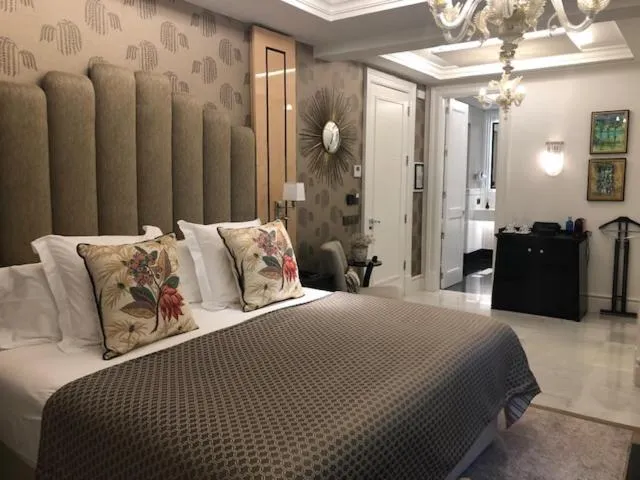 Bedroom in Hotel Casa Palacio María Luisa