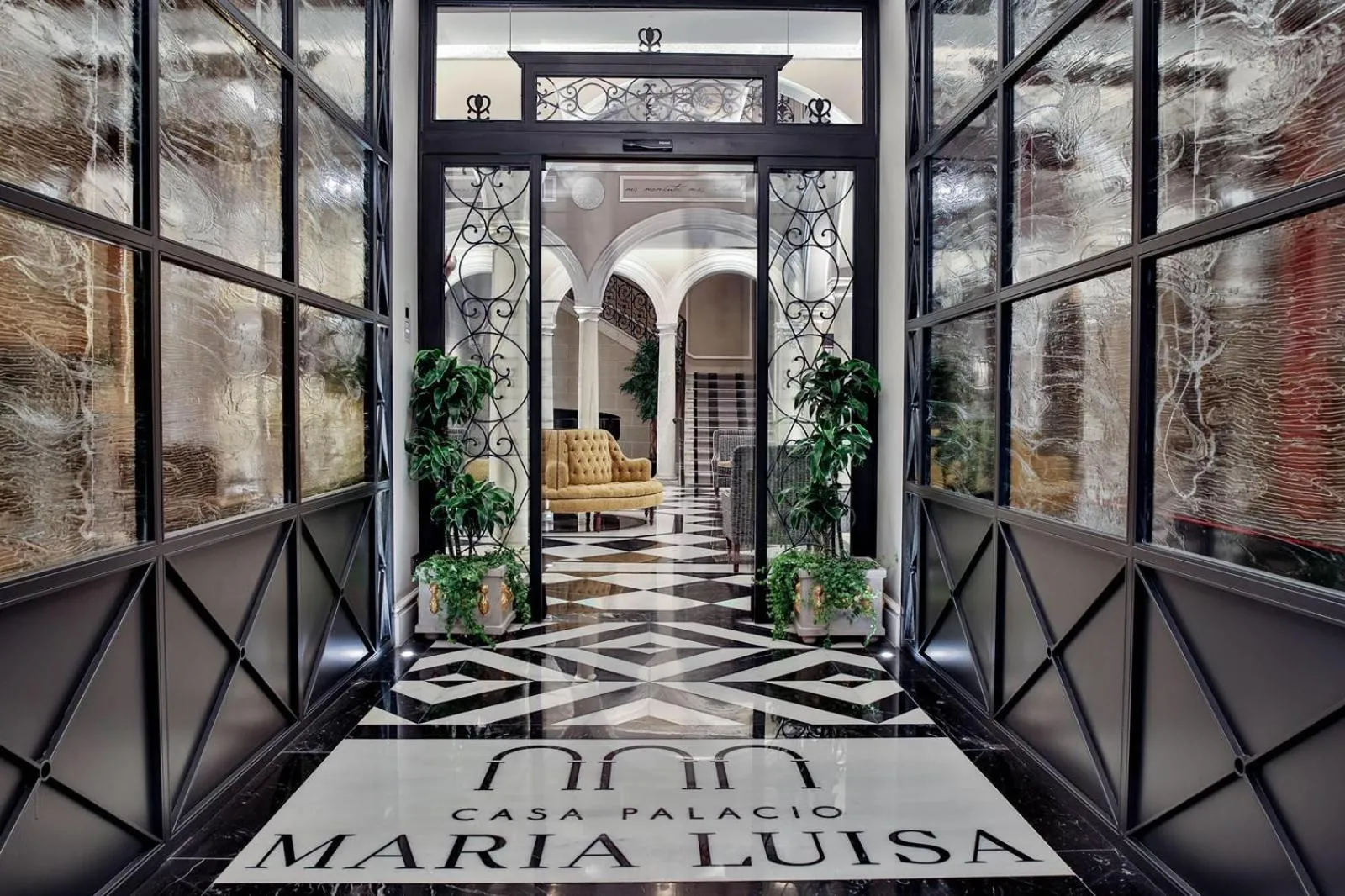 Lobby or reception in Hotel Casa Palacio María Luisa