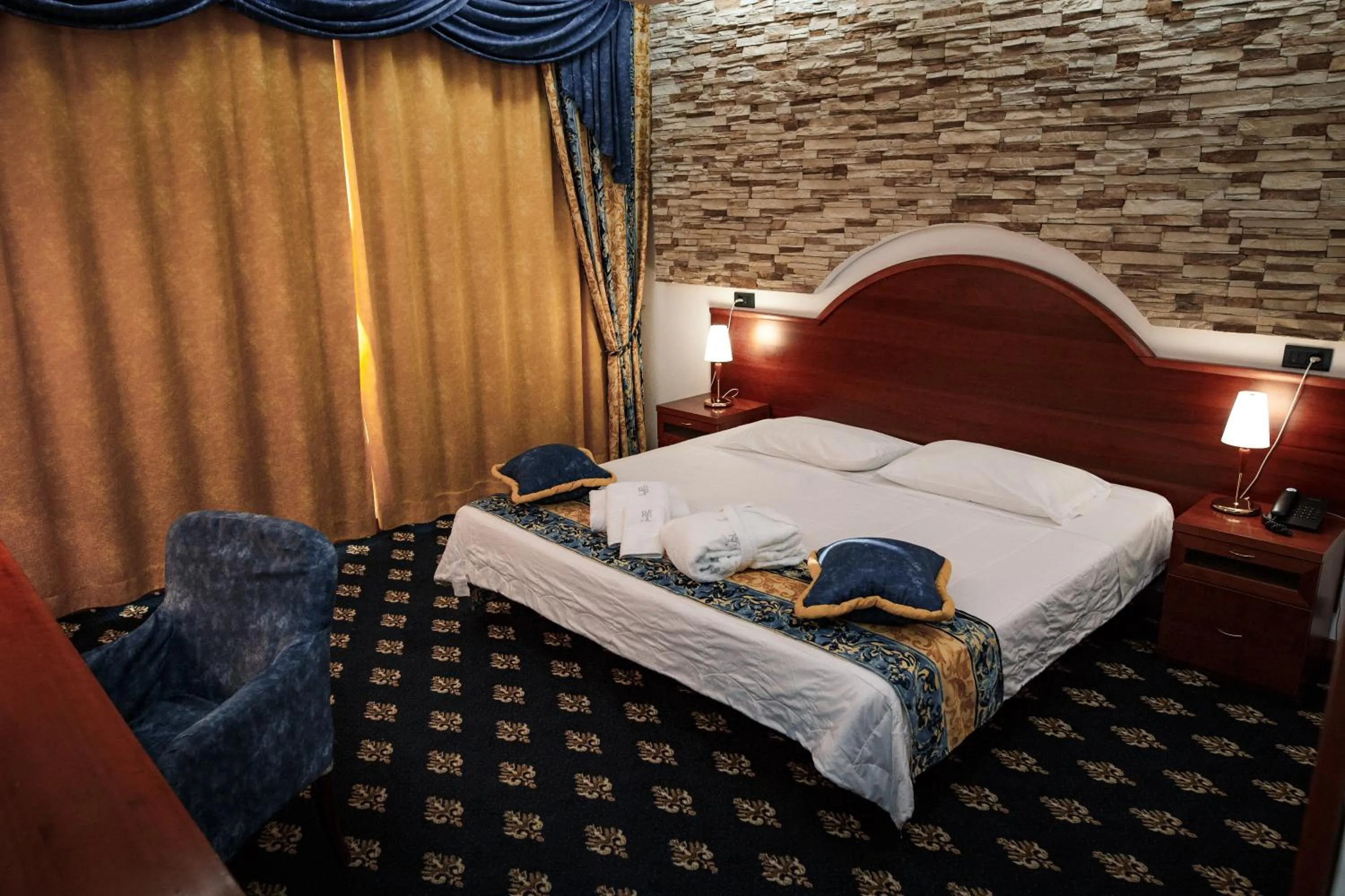 Bed in River Palace Hotel