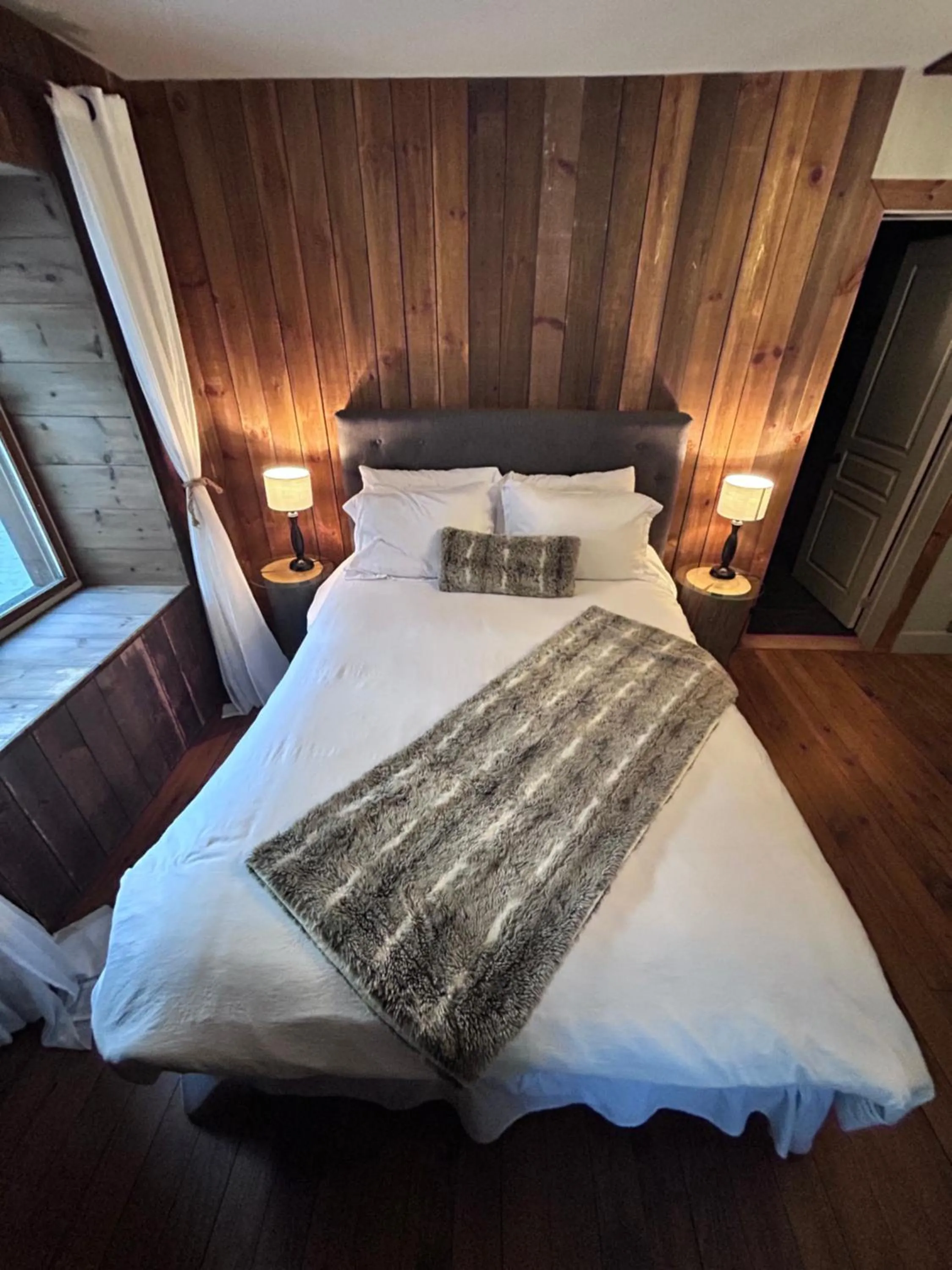 Bed in Auberge le Cosy Tremblant