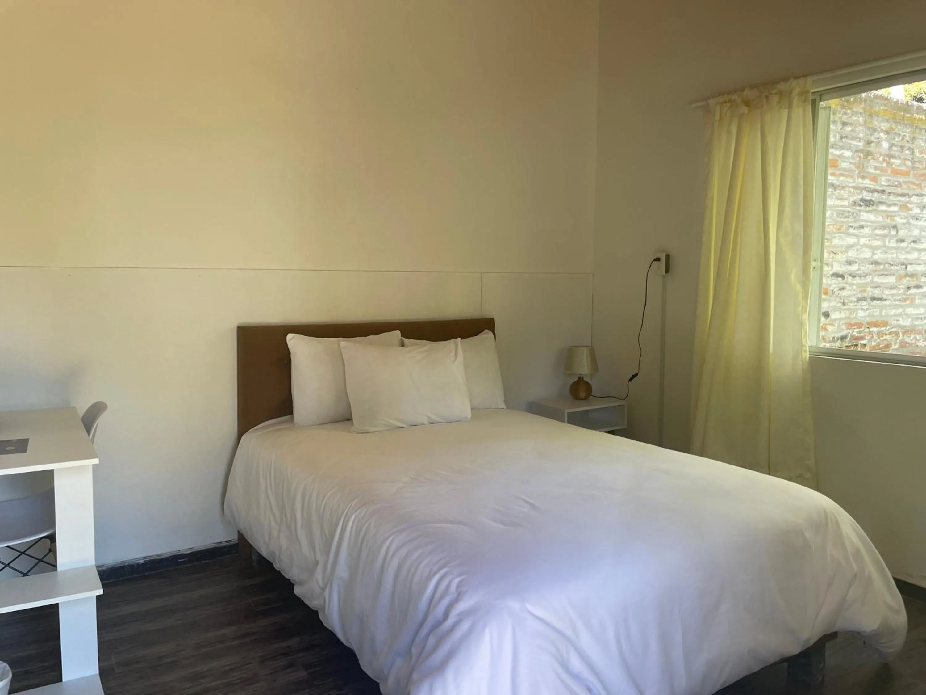 Bed in Quito Airport Suites Hotel