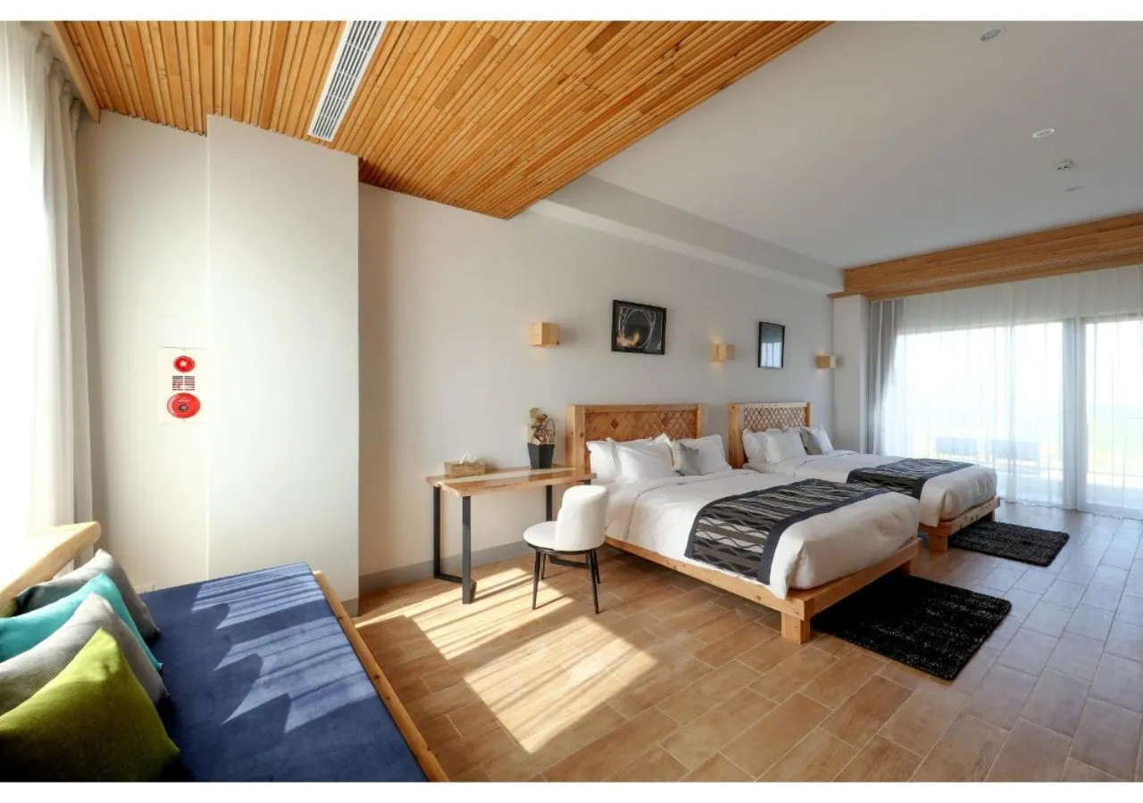 Photo of the whole room, Bed in SkyeBay Club