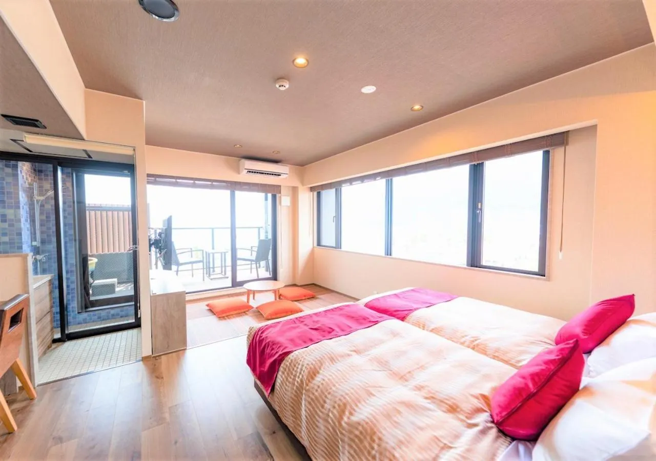 Bed in LiVEMAX RESORT Atami Sea Front