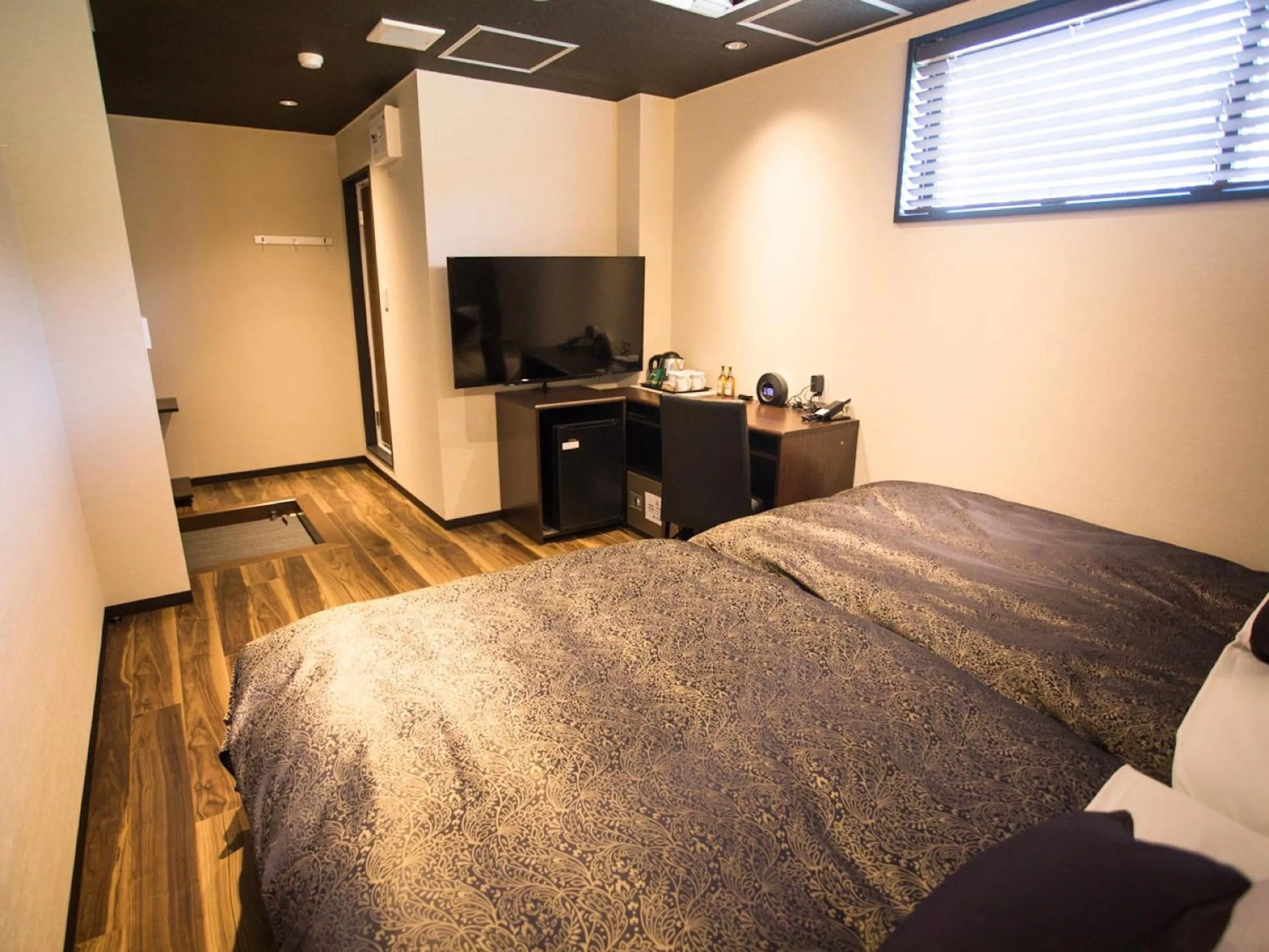 Bed in LiVEMAX RESORT Kyotango Sea Front