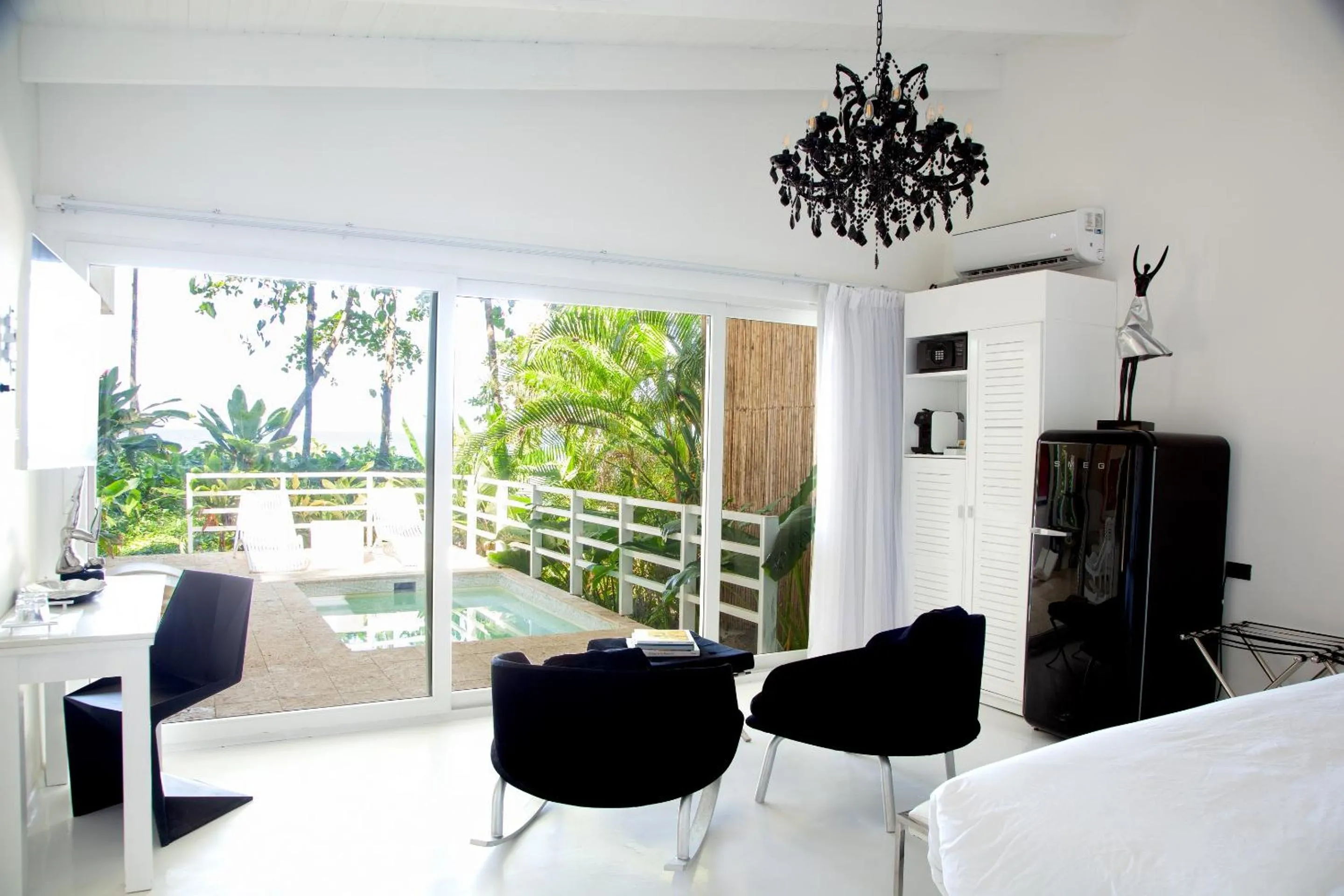 Bed in Le Cameleon Hotel