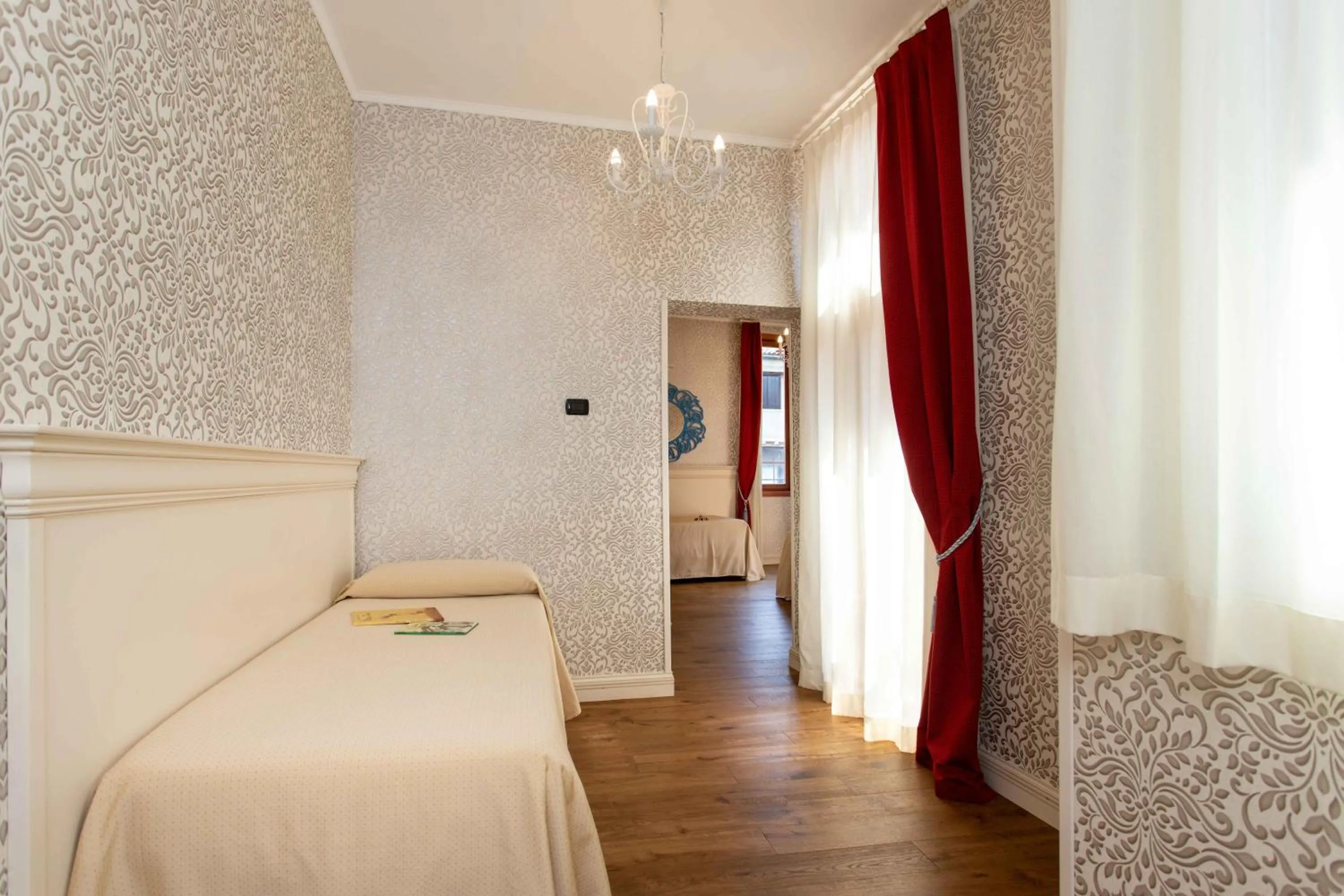 Bed in Charming Palace Santa Fosca