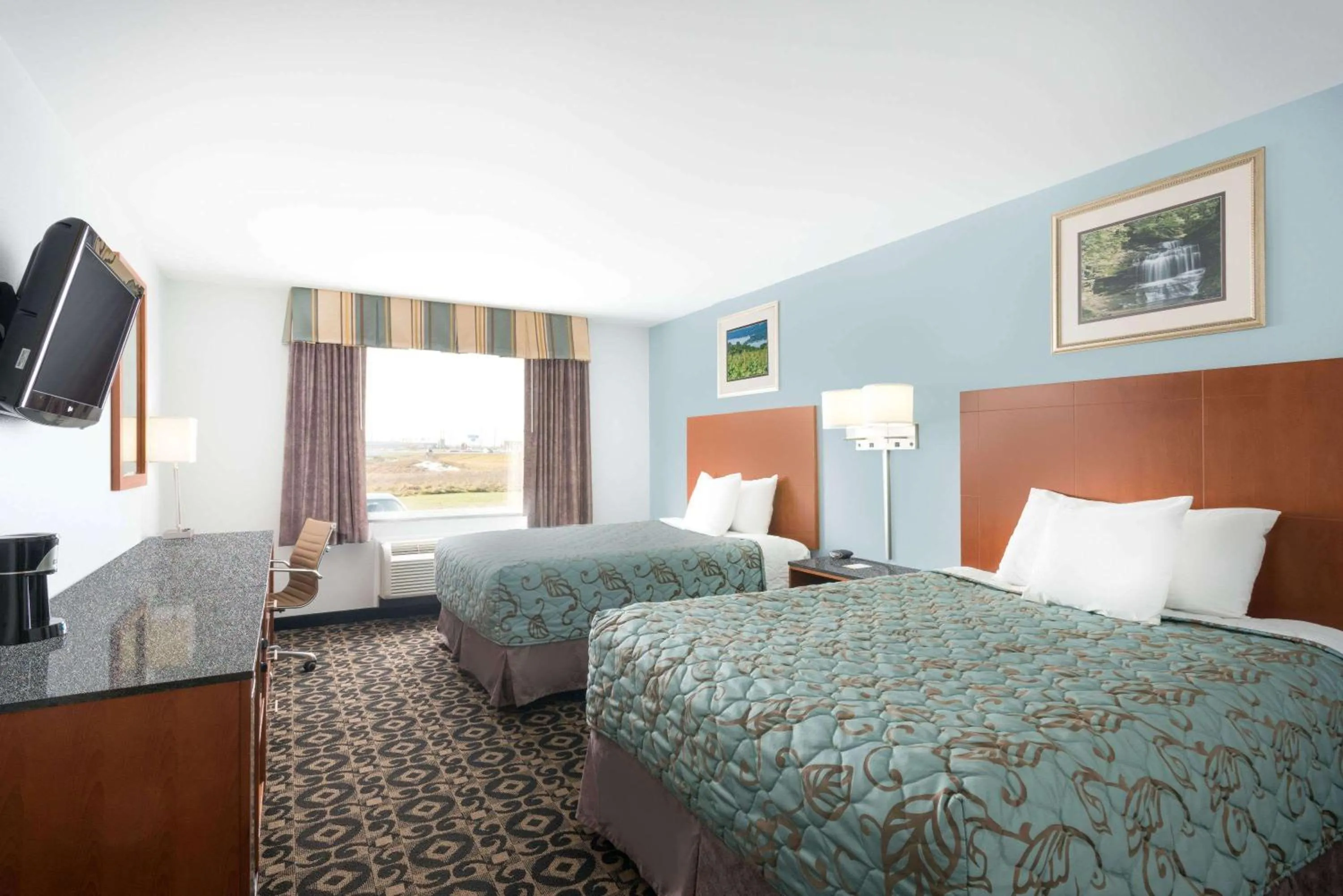 Photo of the whole room, Bed in Days Inn by Wyndham Watertown Fort Drum