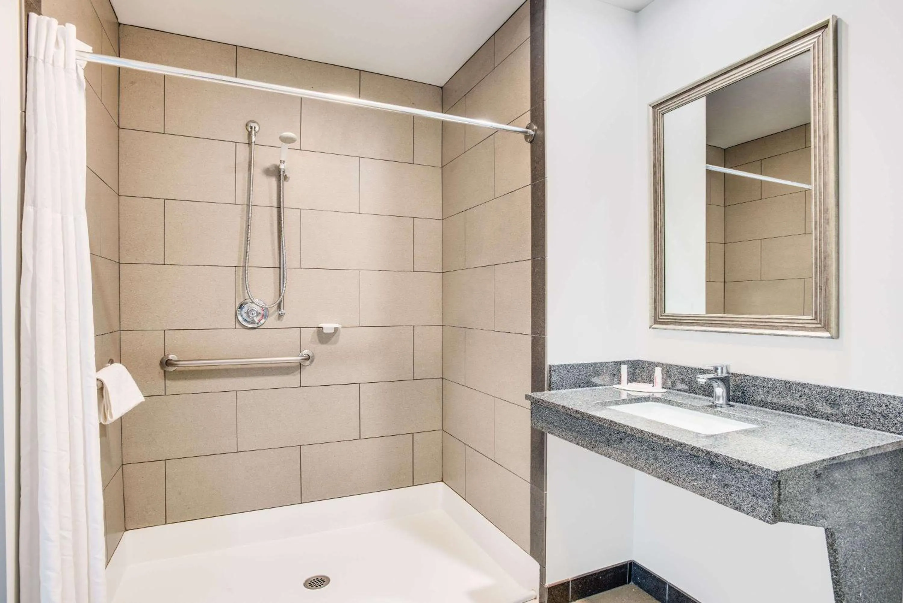 Bathroom in Days Inn by Wyndham Watertown Fort Drum