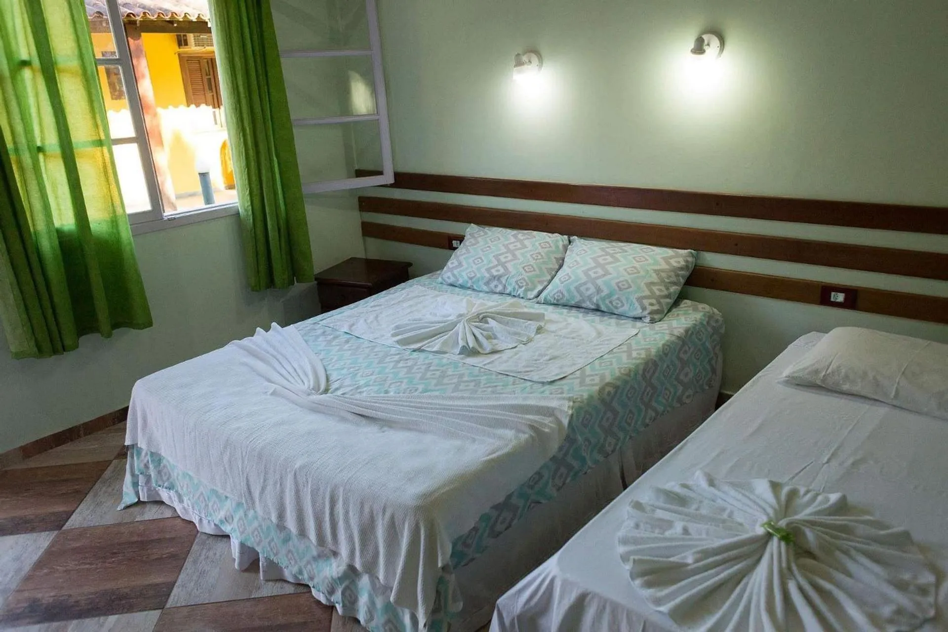 Bed in Pousada Recanto dos Lima