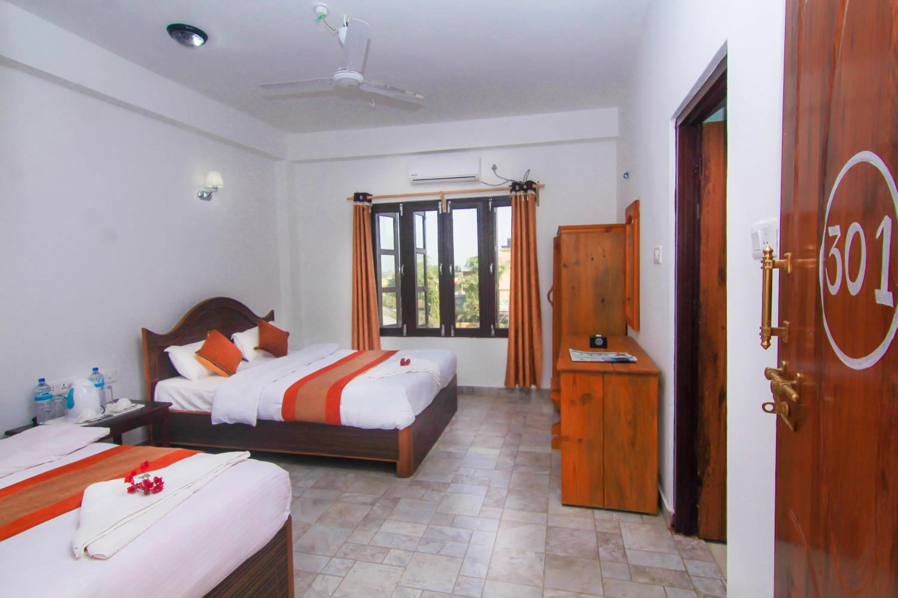 Bed in Hotel Chitwan Park Village