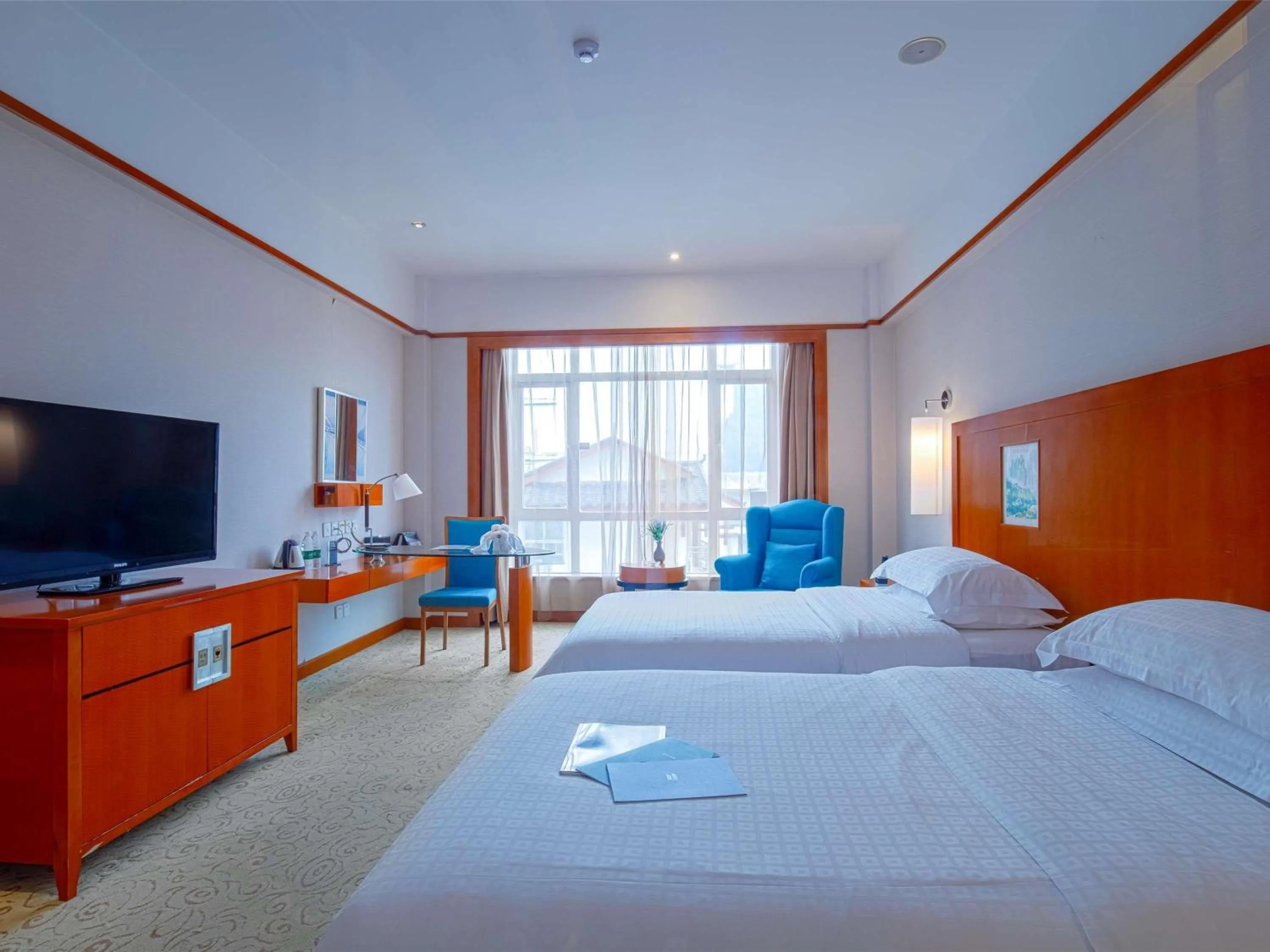 Bedroom, Bed in Pullman Zhangjiajie Hotel