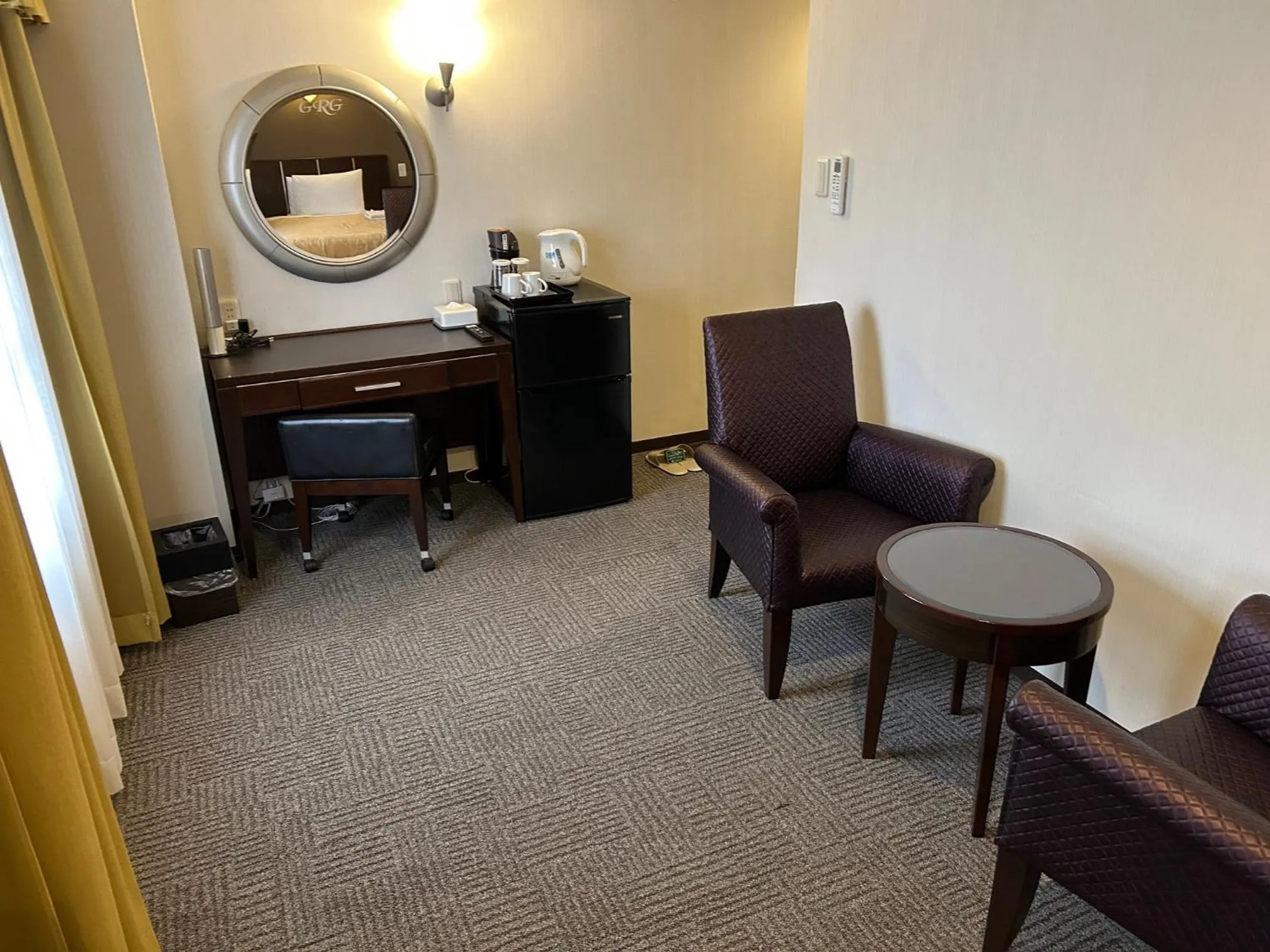 Living room in GRG Hotel Naha