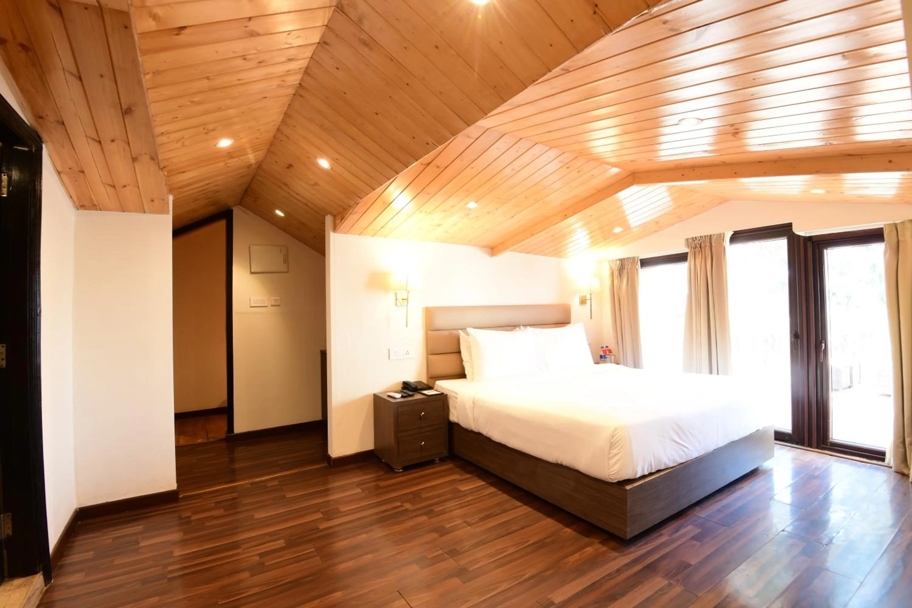 Bed in Ramada by Wyndham Kasauli