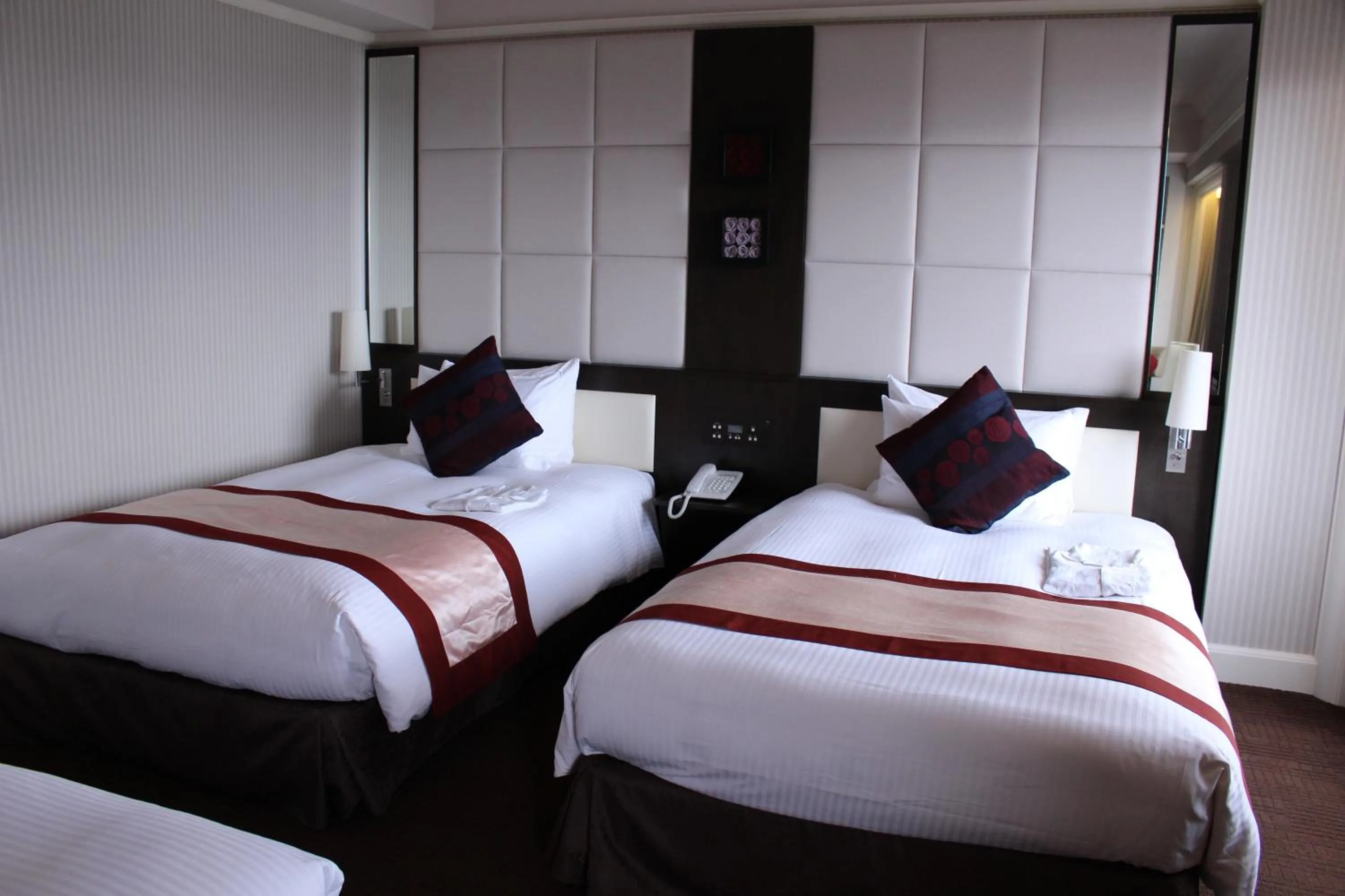 Bed in Dai-ichi Hotel Tokyo Seafort