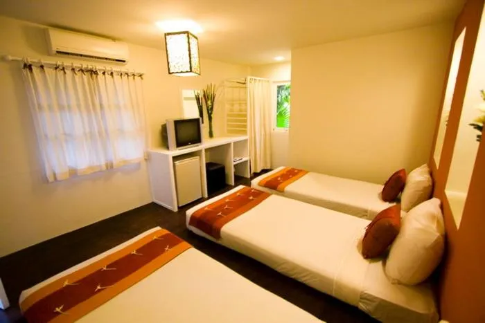 Bed in Rain Forest Resort