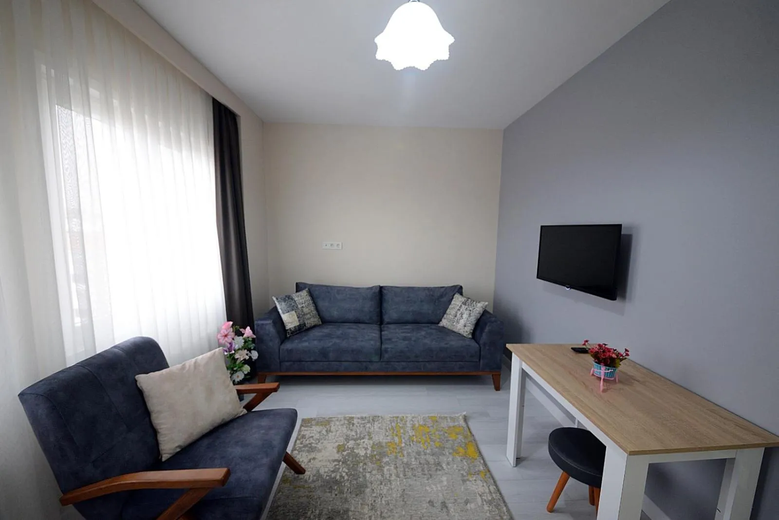 Communal lounge/ TV room in city59 Suit Otel