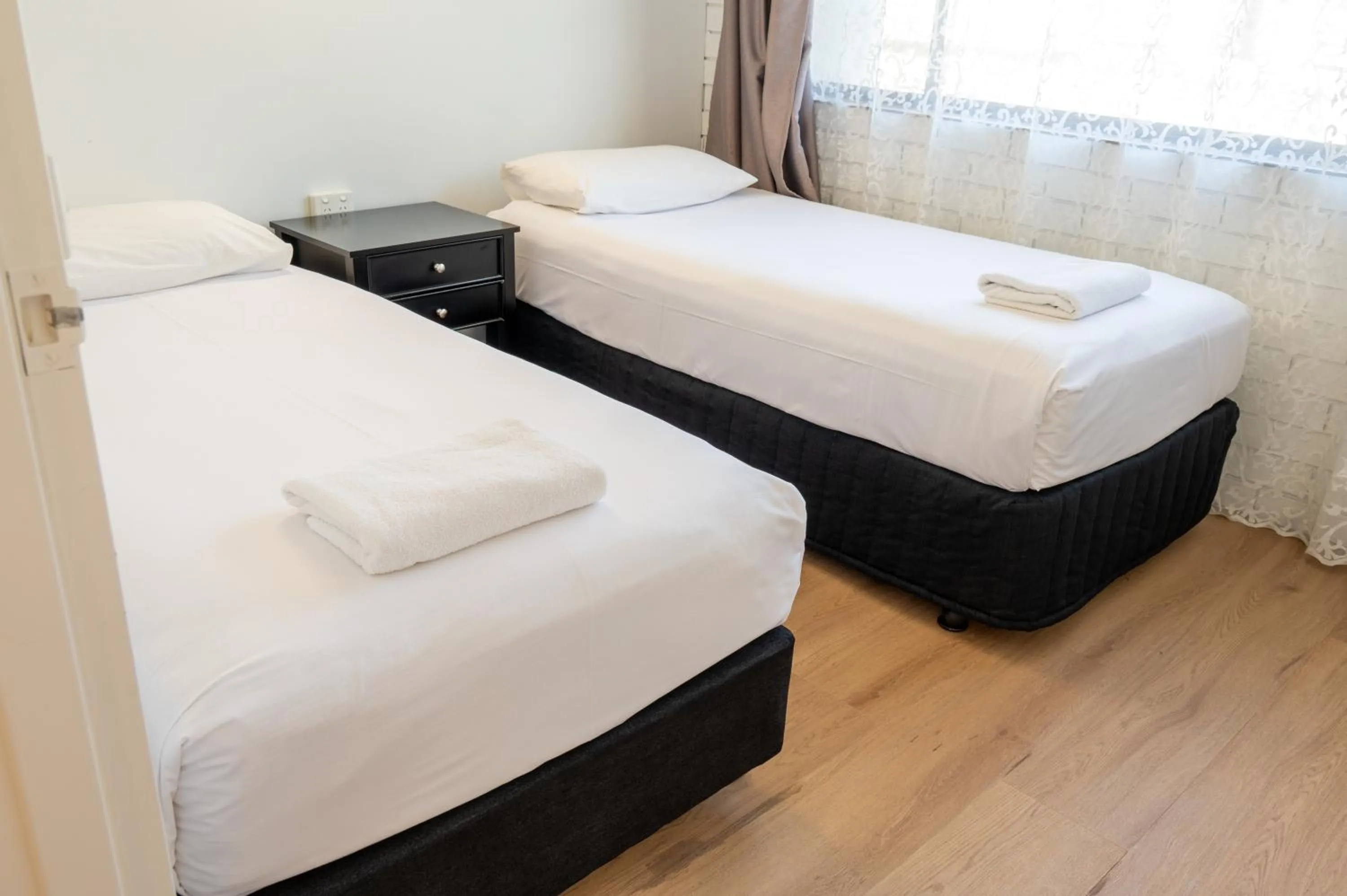 Bed in Tumut Valley Motel Pet Friendly