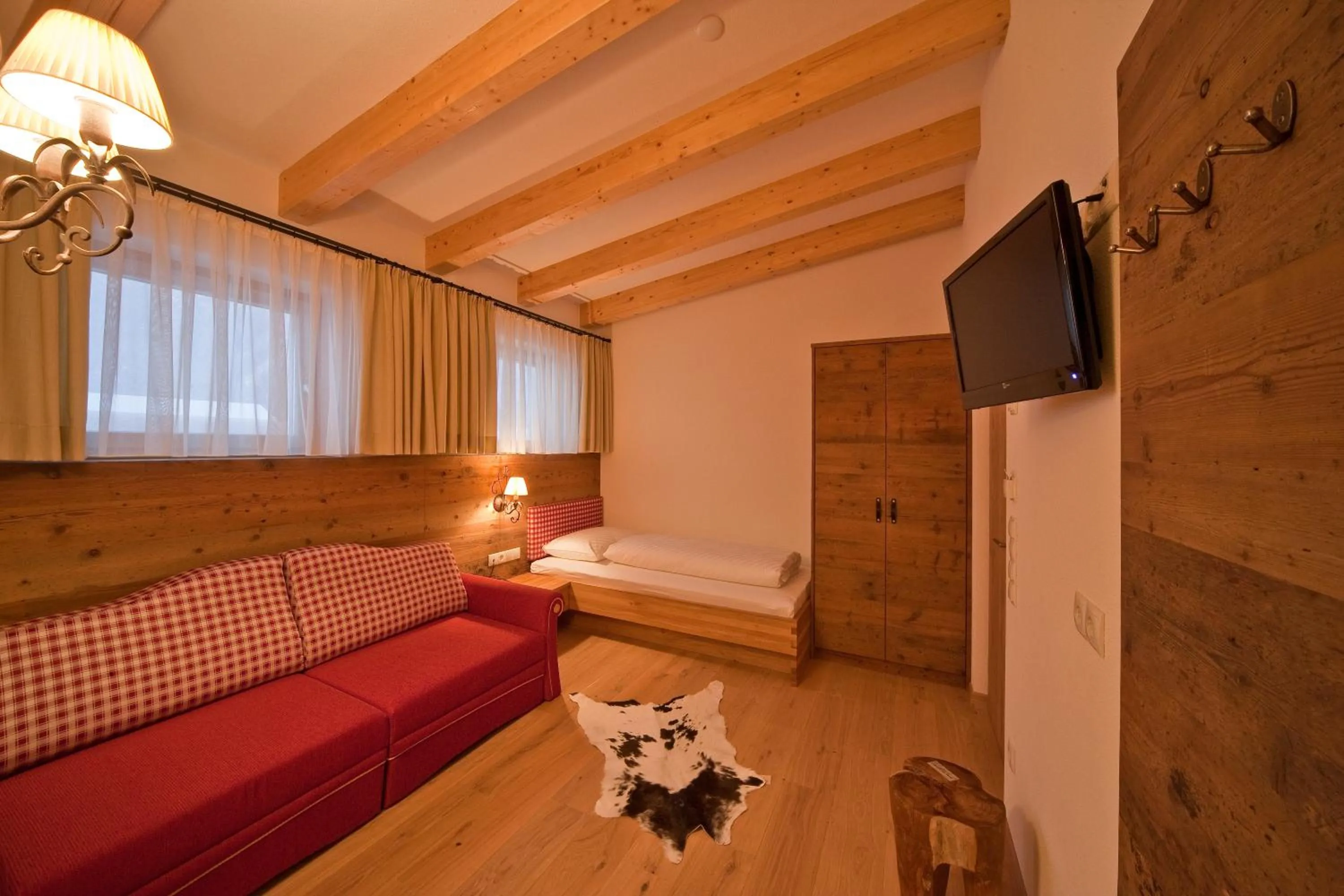 Photo of the whole room, Bed in Hotel Foestlerhof