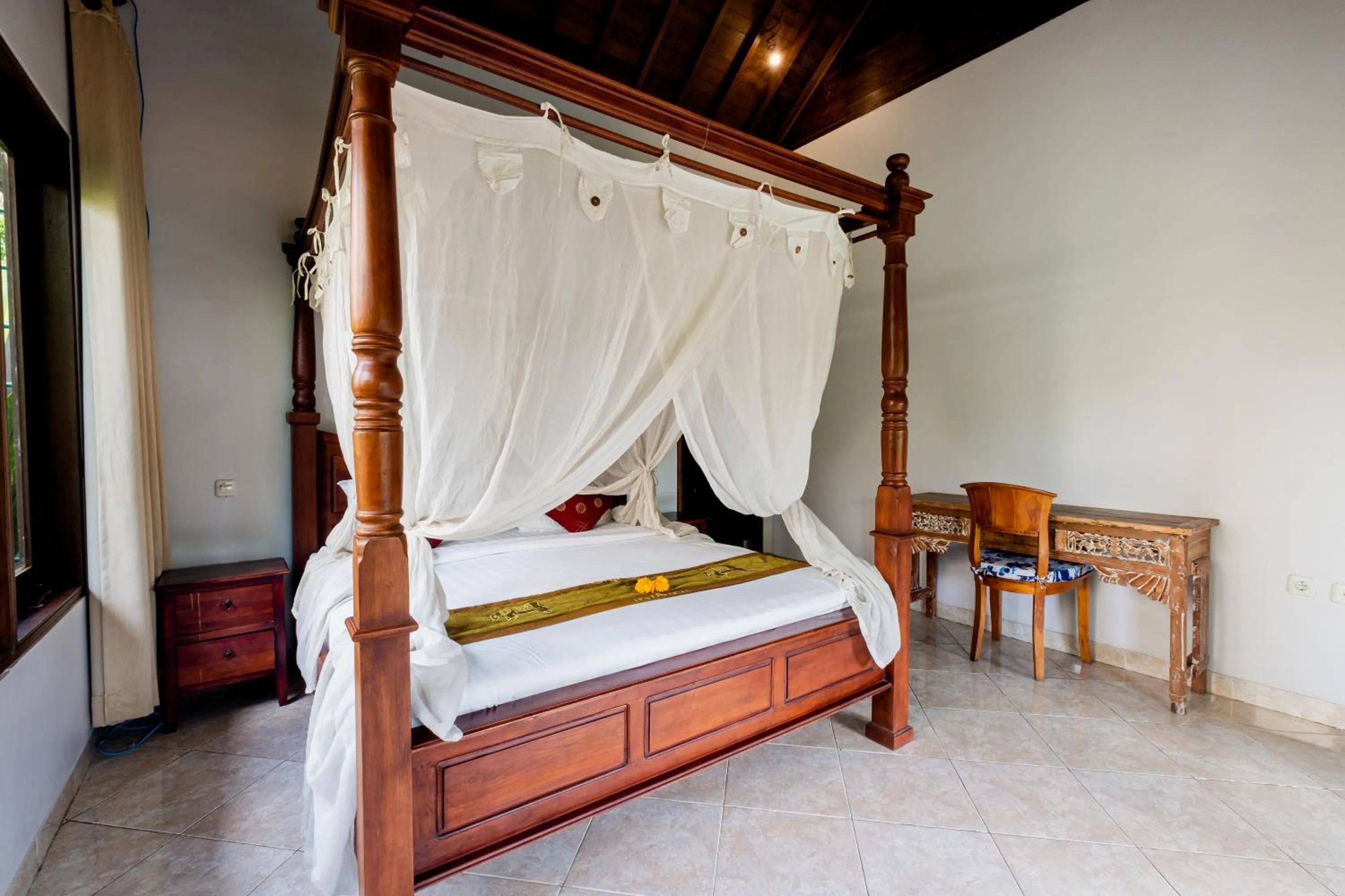 Bed in Pukakoo Villas and Suite by Supala