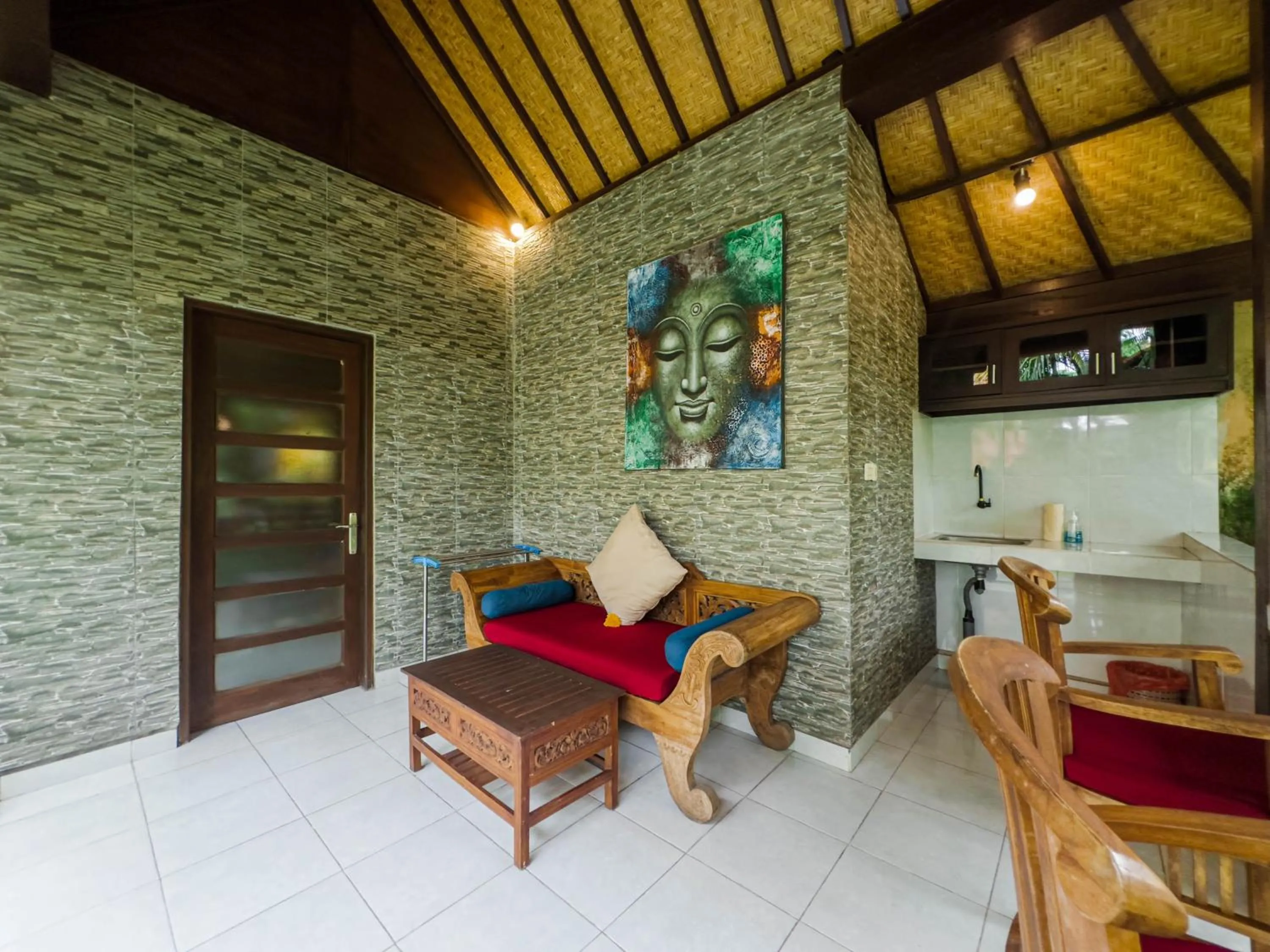Seating area in Pukakoo Villas and Suite by Supala