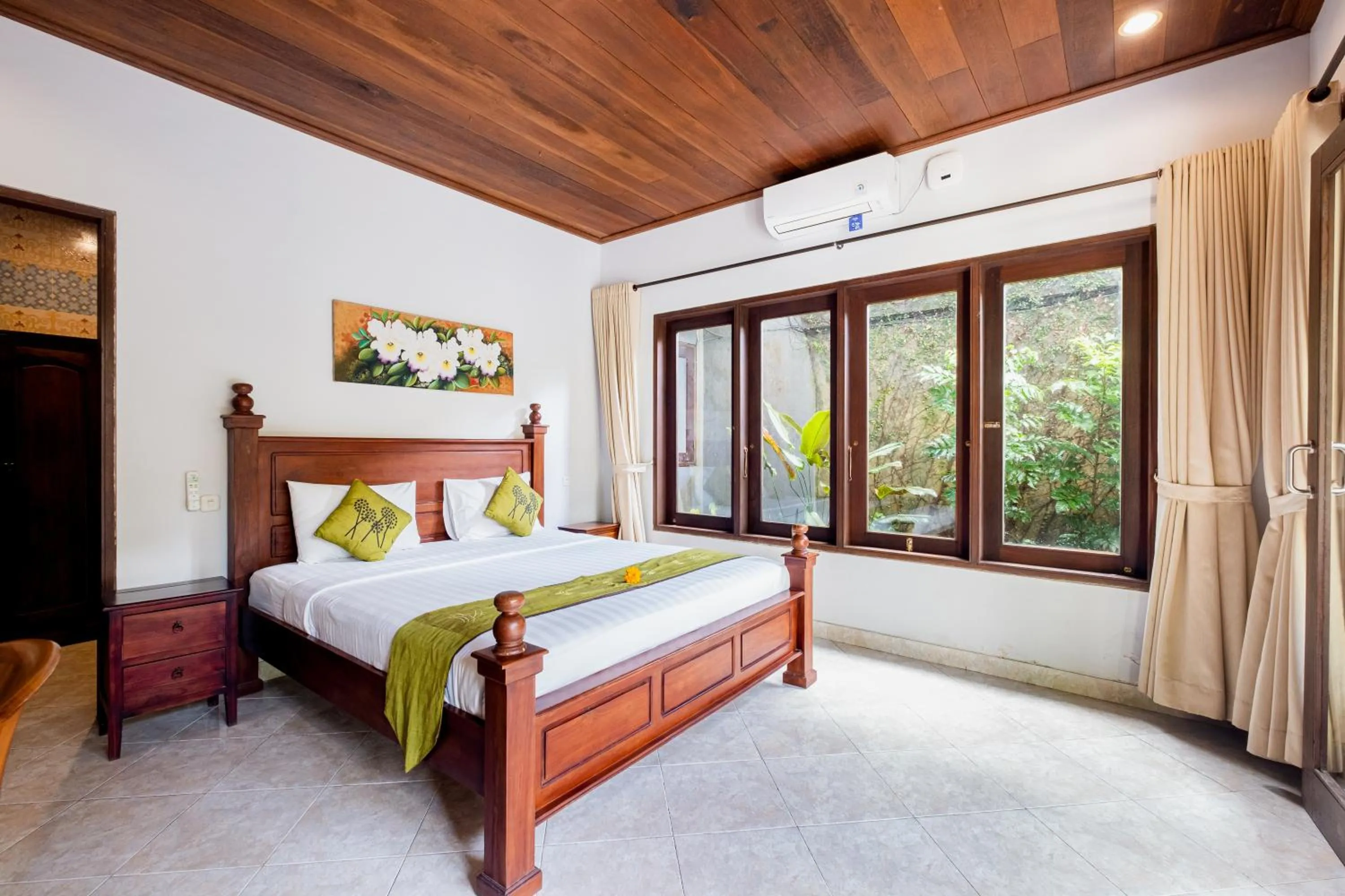 Bed in Pukakoo Villas and Suite by Supala