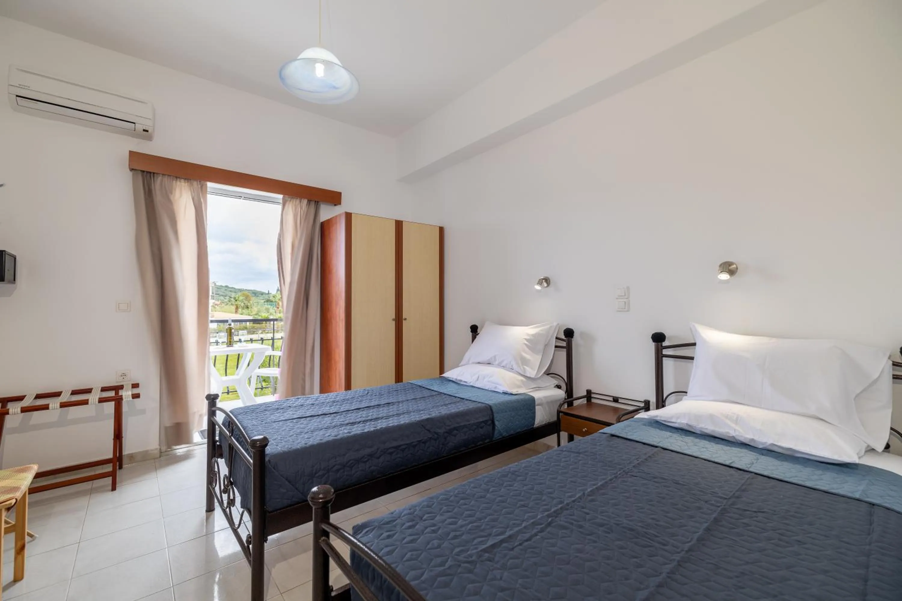 Bed in Valianos Studios - Apartments