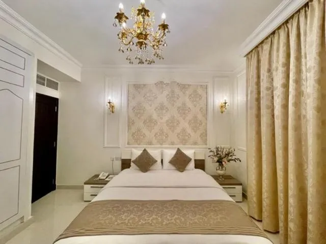 Bed in A'Sinamar Hotel Apartment