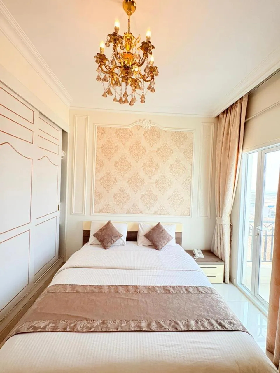 Bed in A'Sinamar Hotel Apartment