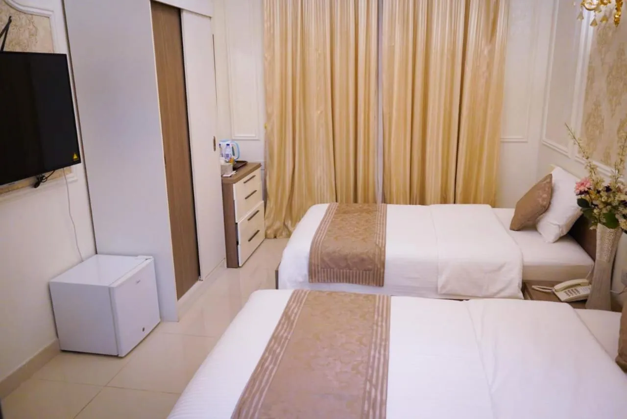 Bed in A'Sinamar Hotel Apartment