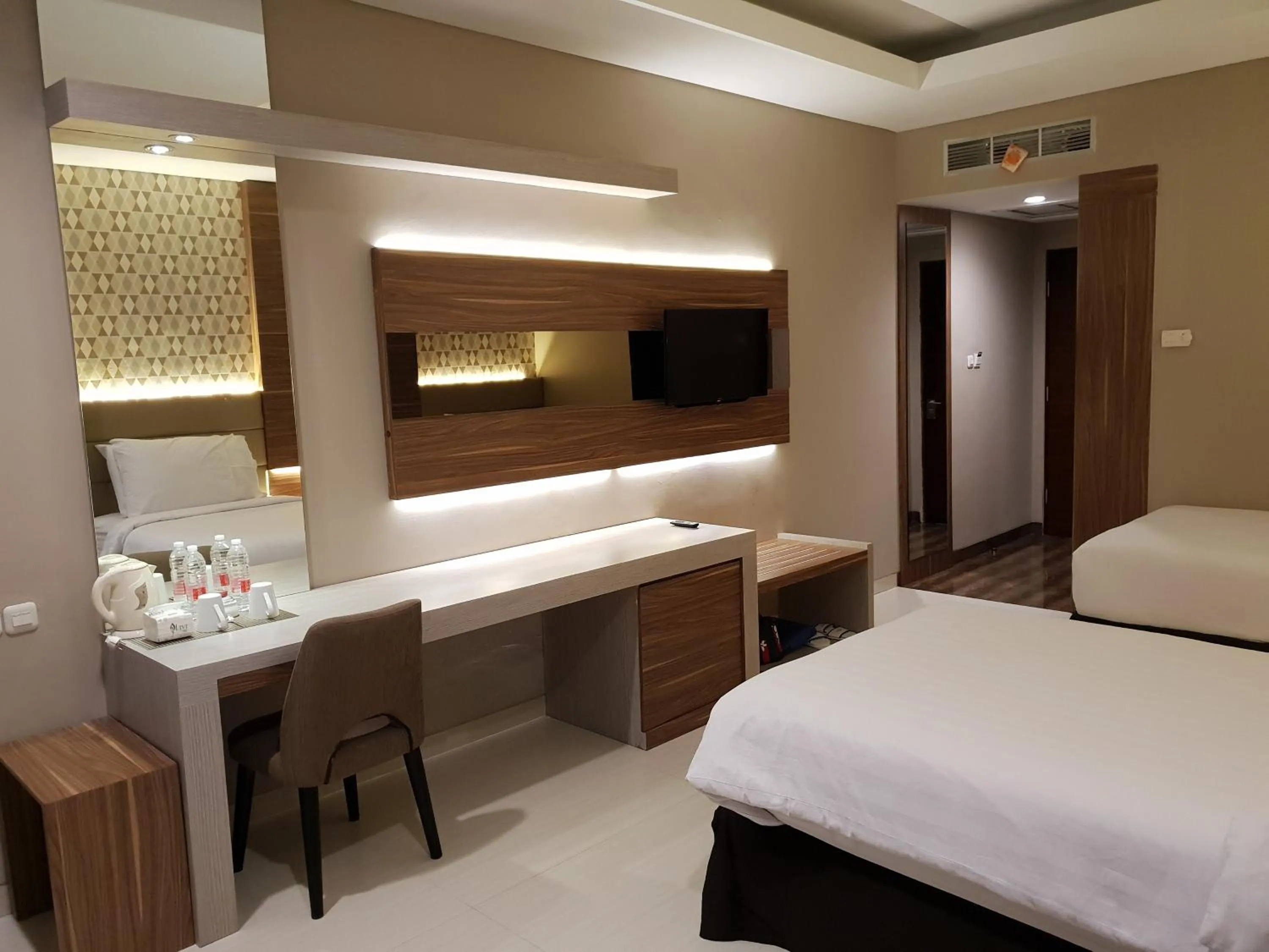 Coffee/tea facilities, Bed in Novena Hotel Bandung
