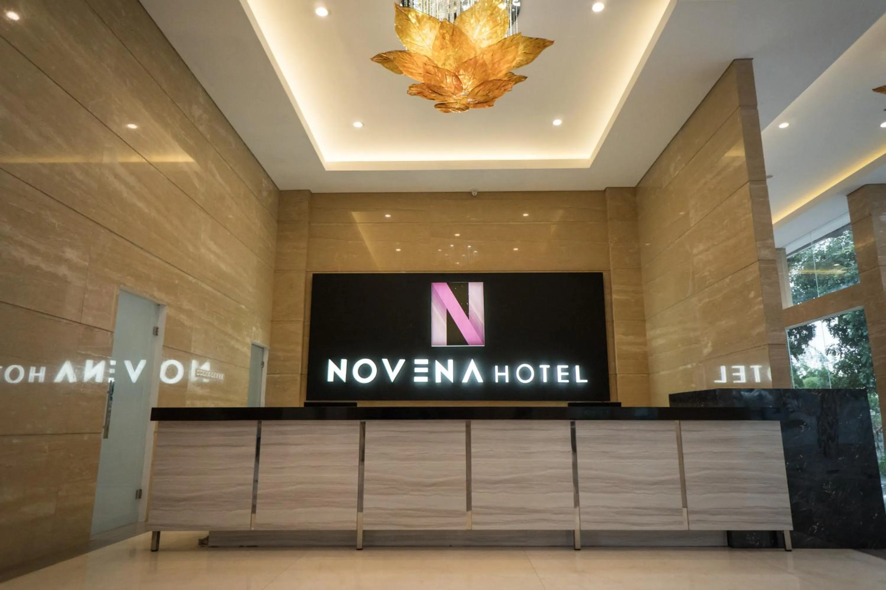 Property logo or sign in Novena Hotel Bandung