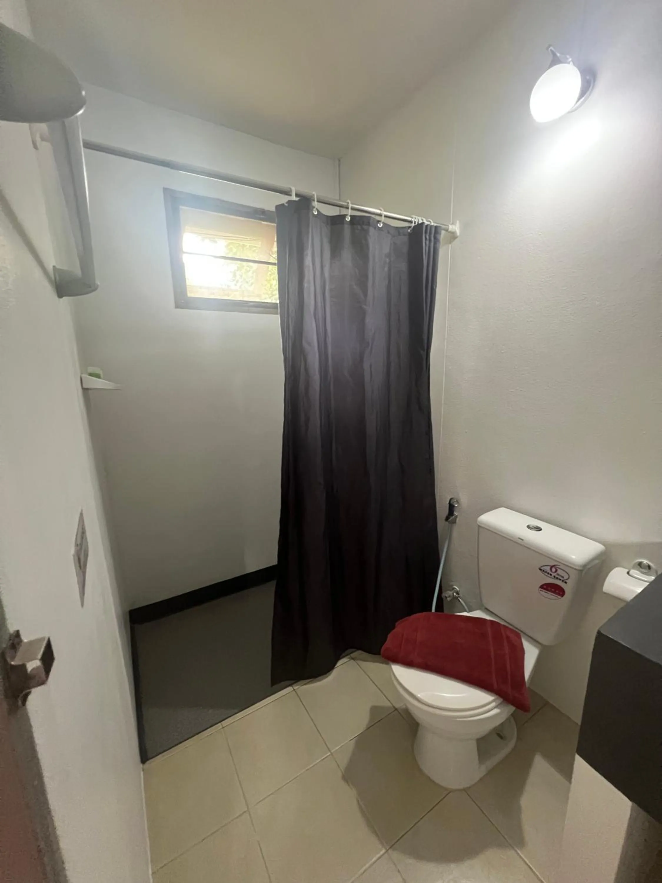 Toilet in Tropical Paradise Leelawadee Resort