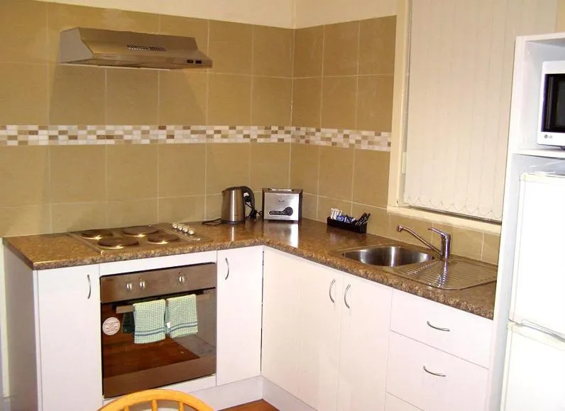 Kitchen or kitchenette in Koala Tree Motel