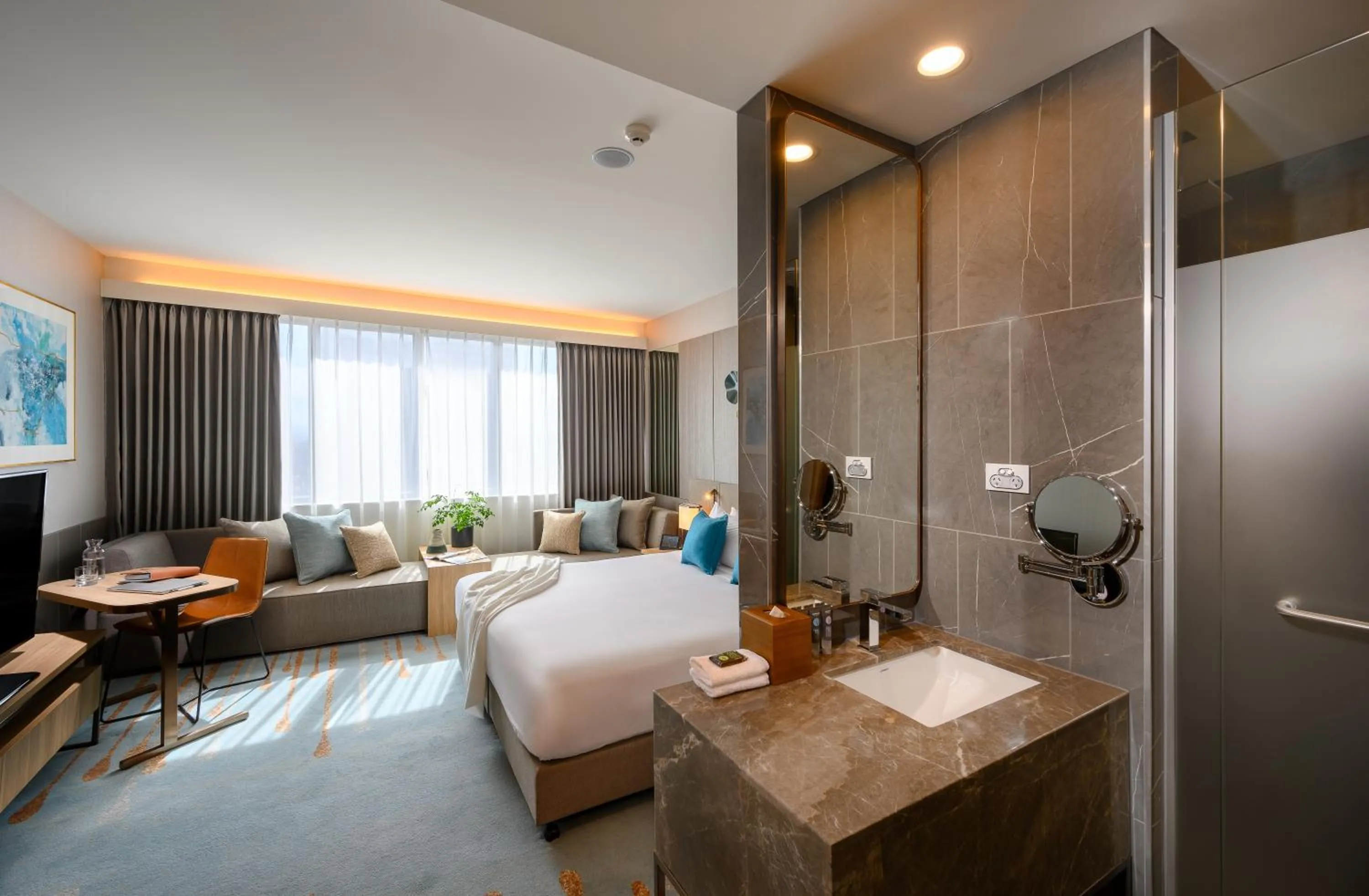 Living room, Bed in Novotel Melbourne Central