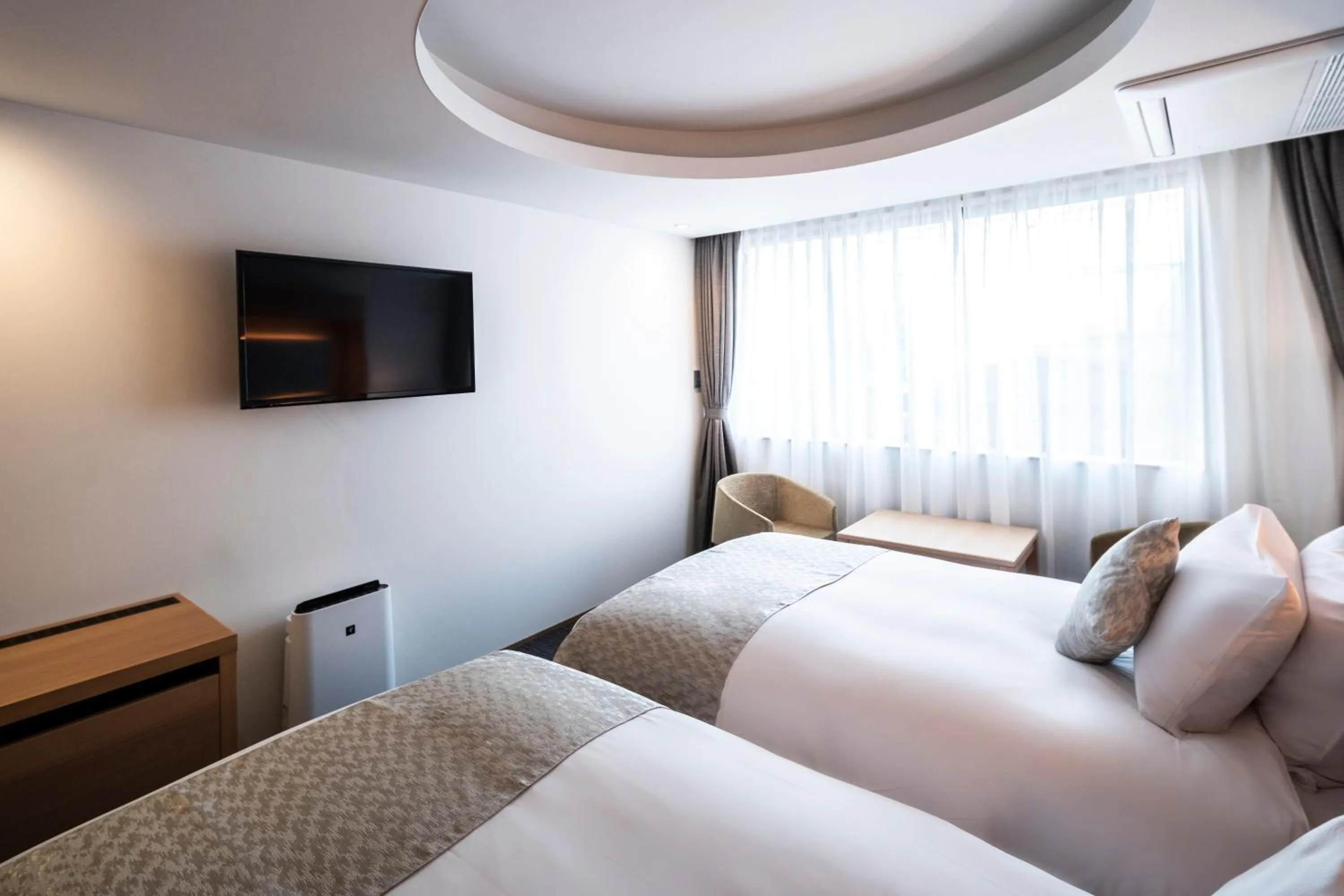 Bed in Kyoto Shijo Takakura Hotel Grandereverie