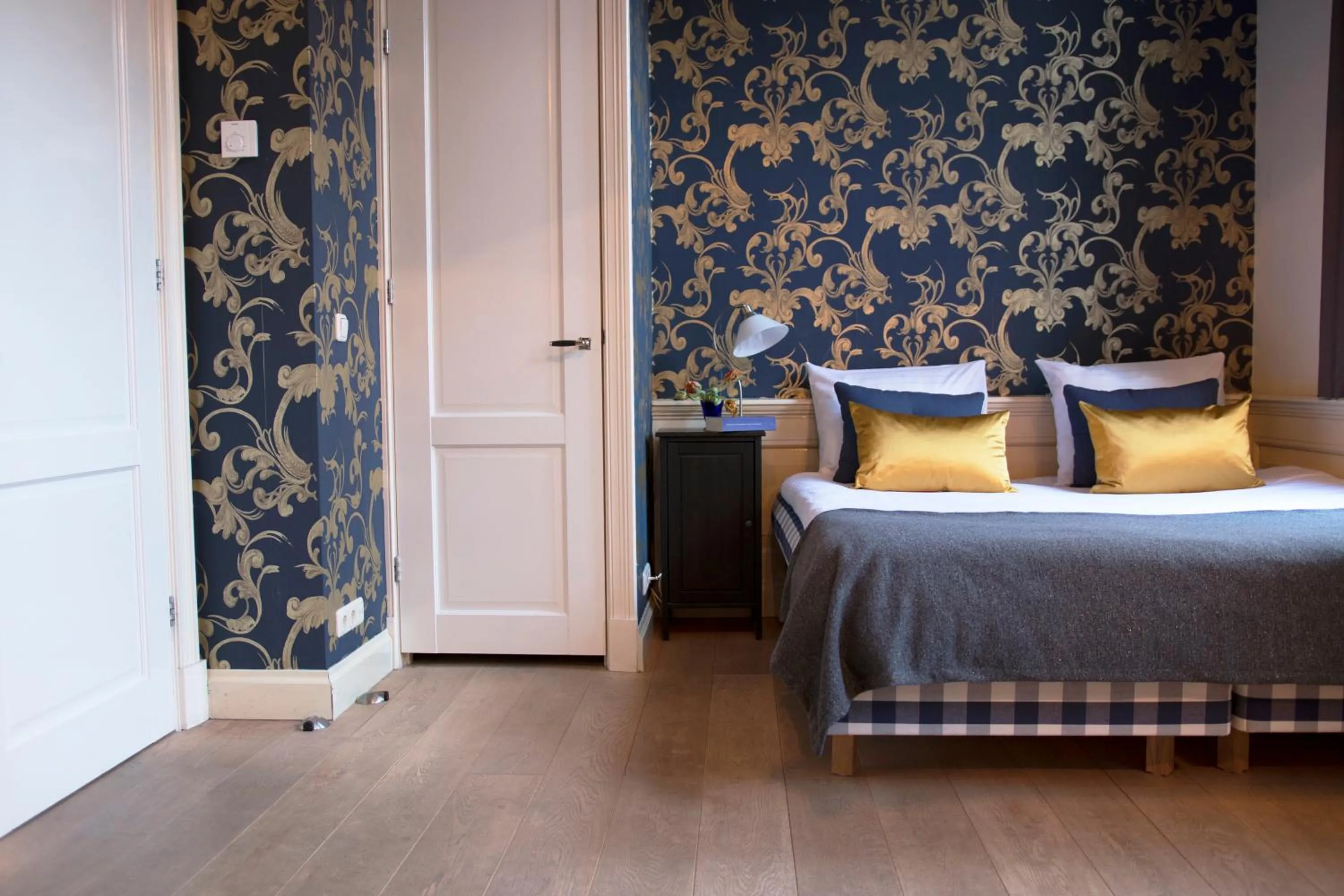 Bed in Grand Canal Boutique Hotel