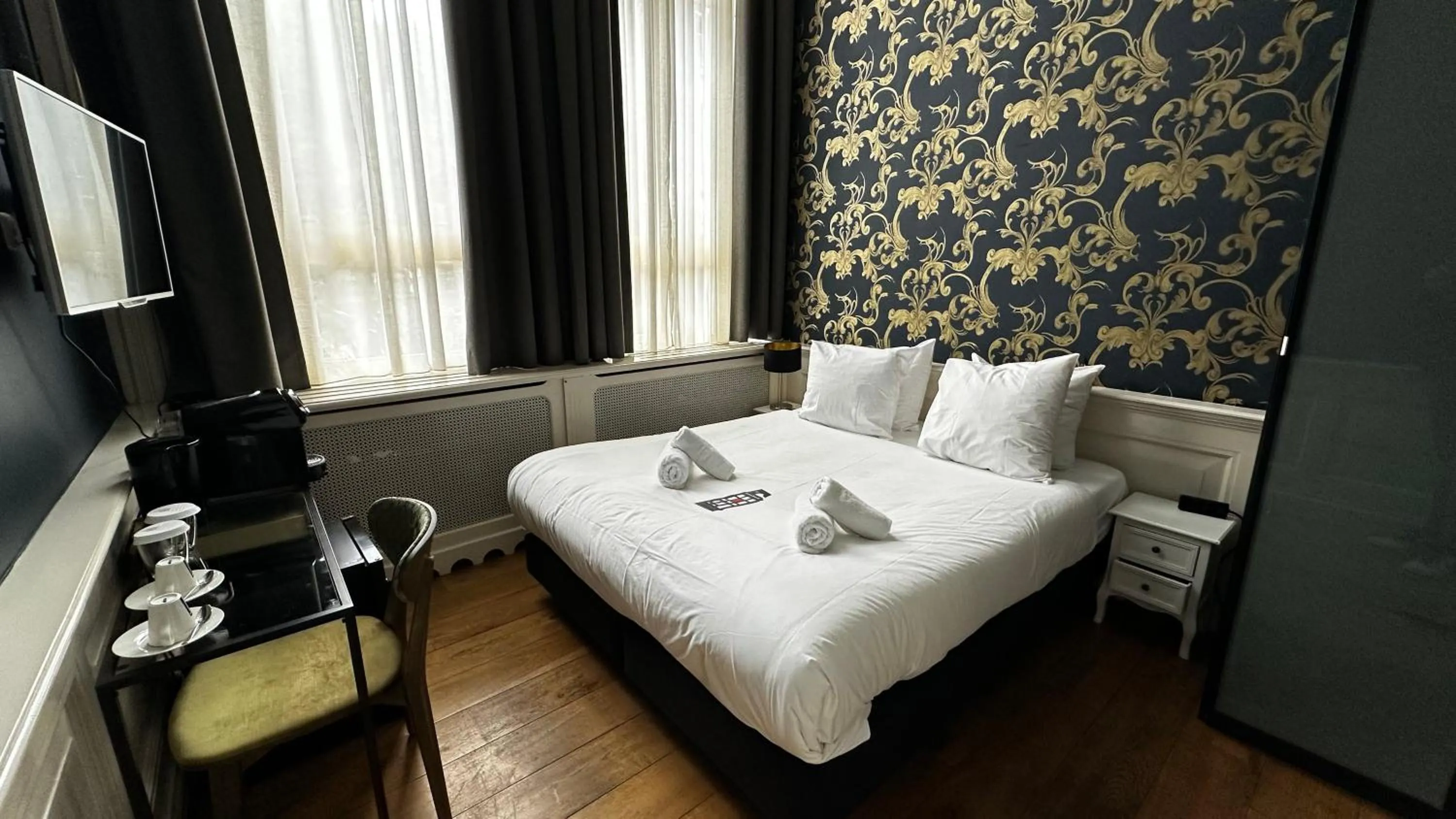 Bed in Grand Canal Boutique Hotel