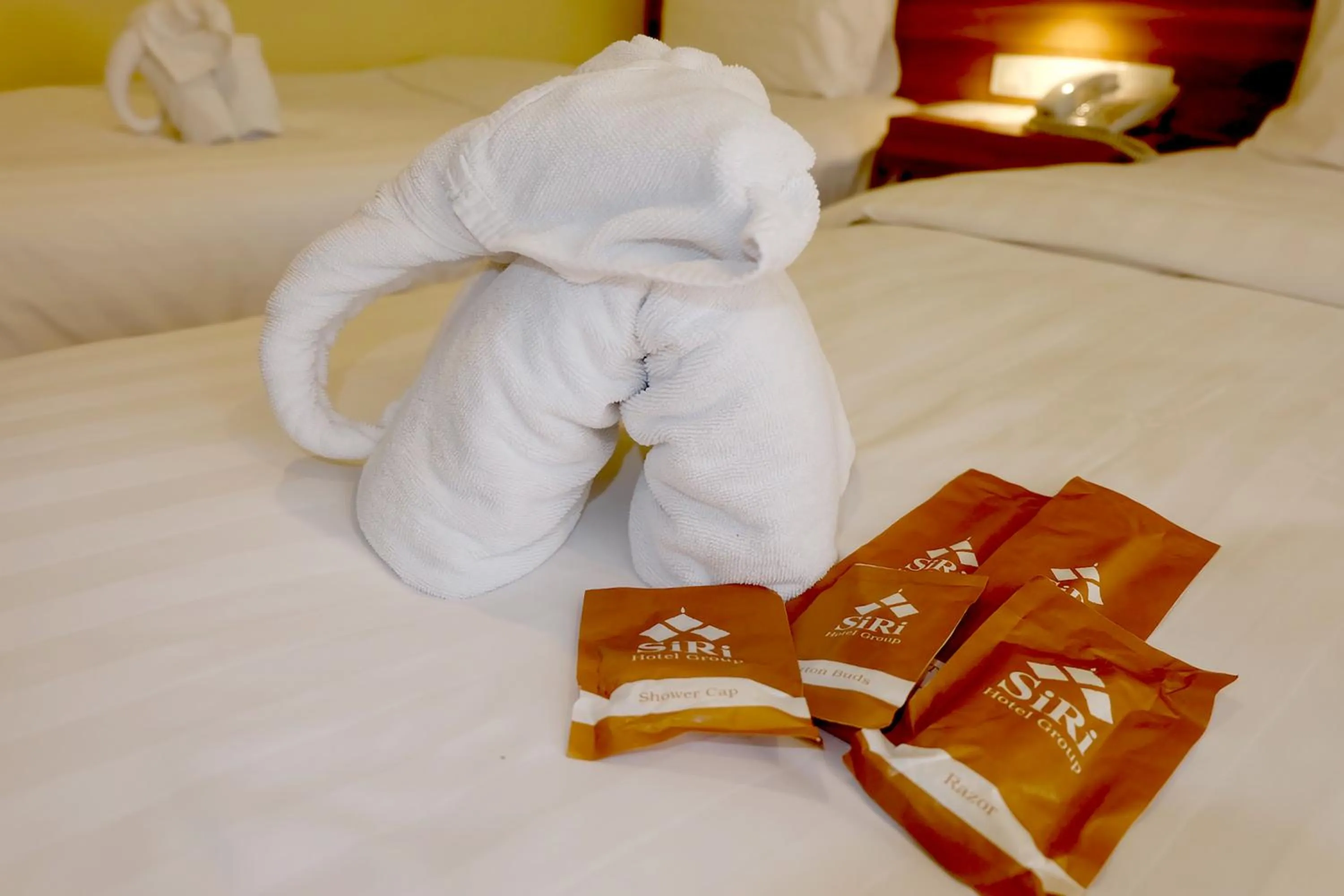 Bed in Siri Oriental Bangkok Hotel